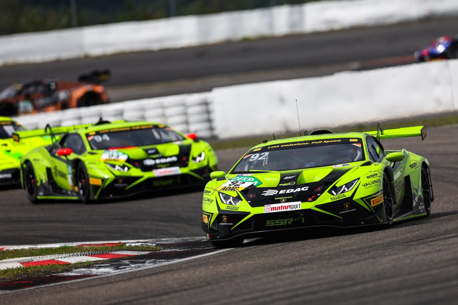 Lime green Lamborghini Huracán GT3 EVO2 number 92 leading the DTM field at Nürburgring