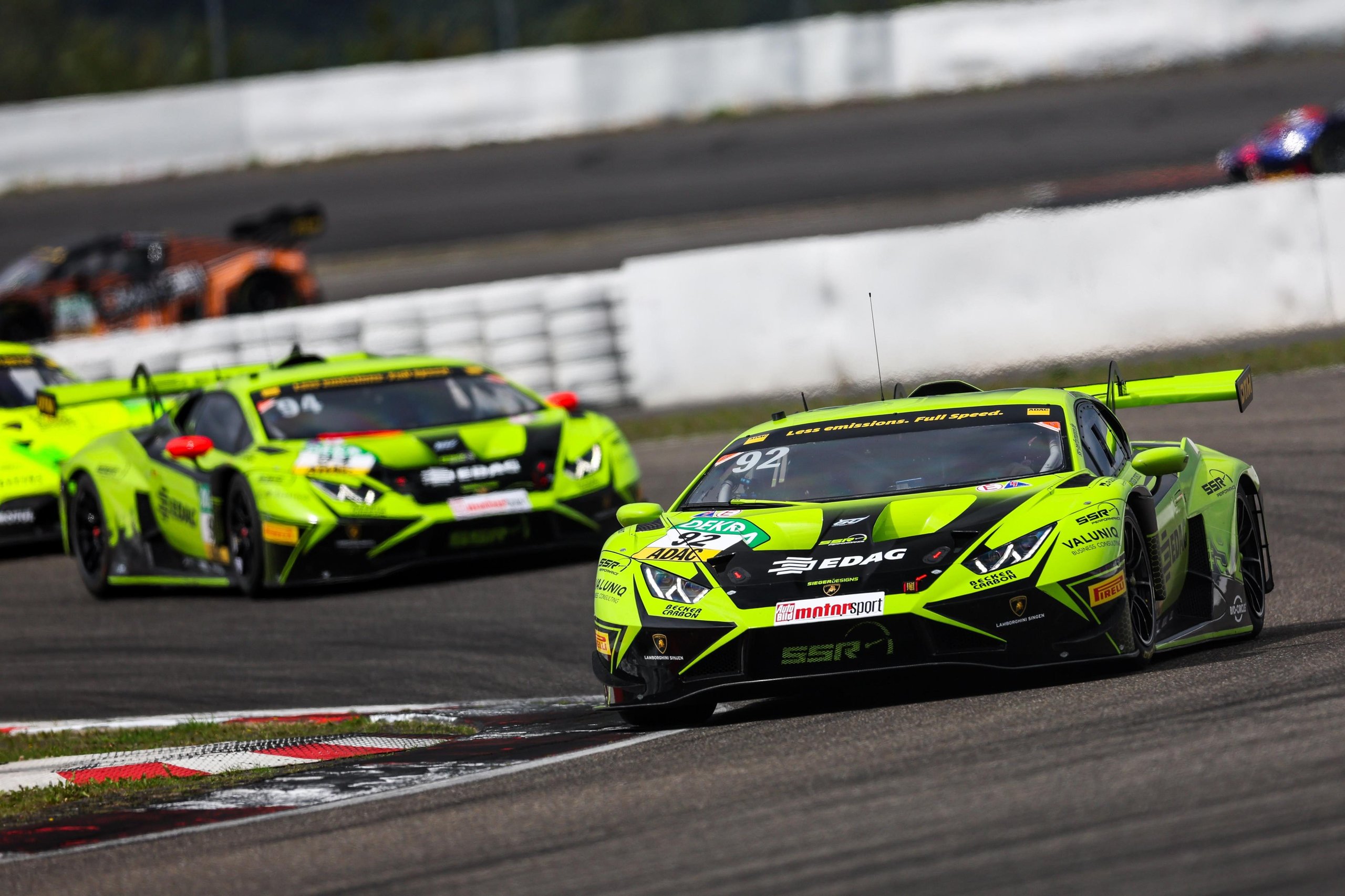 Lime green lamborghini huracán gt3 evo2 number 92 leading the dtm field at nürburgring