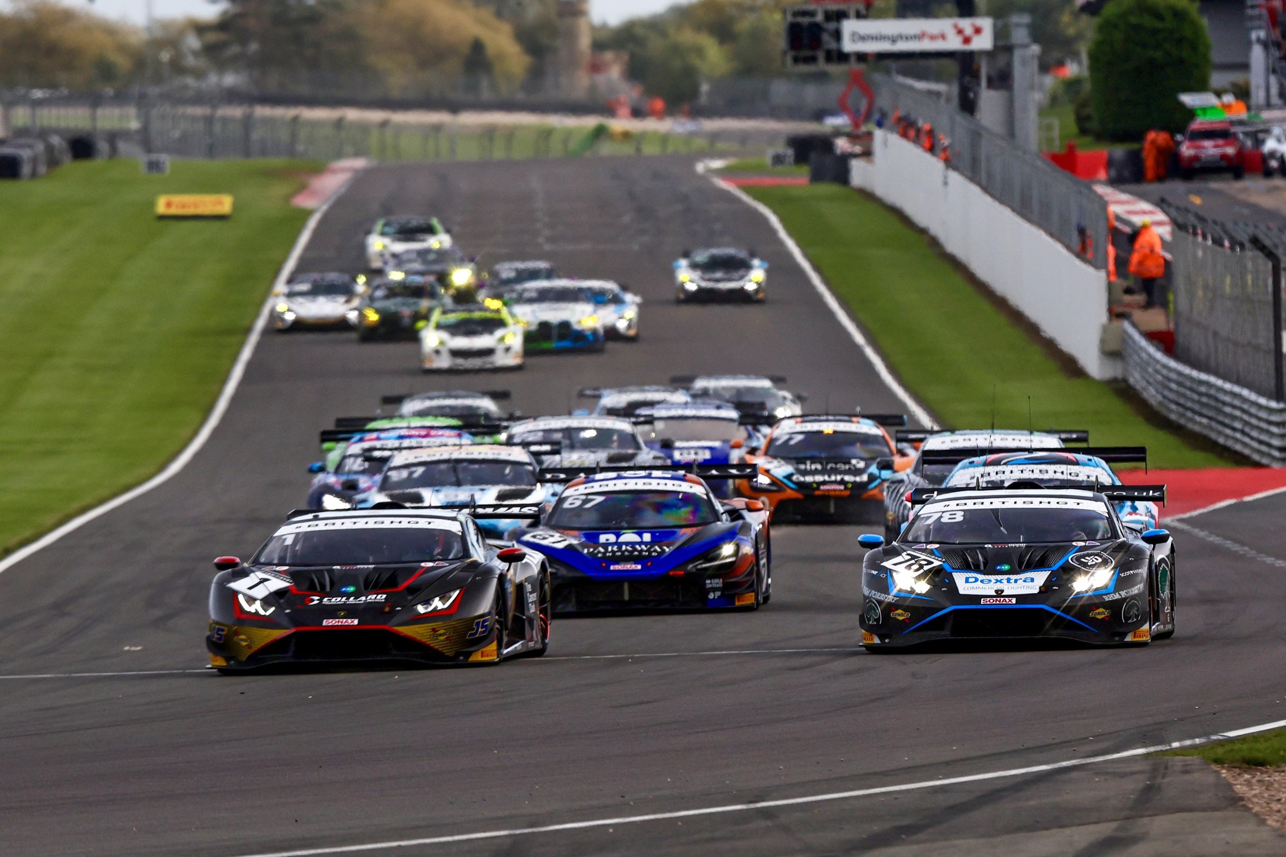 Barwell'S Donington One-Two Puts The Huracán Gt3 One Win From 200 3 Two lamborghini huracán gt3 evo2 race cars lead a pack of competitors down the straight at donington park