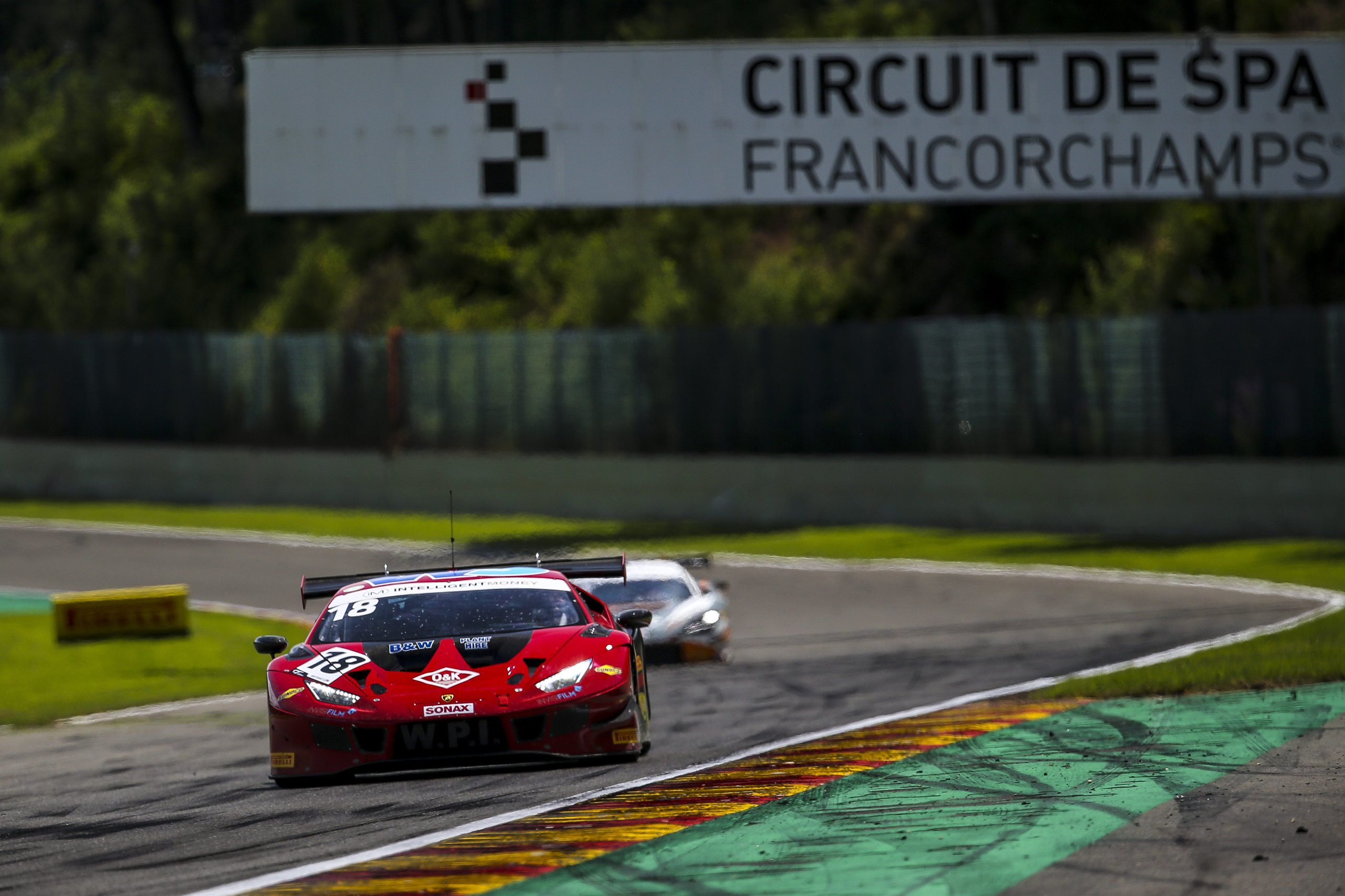 Huracán Gt3 Evo Locks Out The Top Two At Spa, And The 48-Second Margin Tells The Real Story 3 The red #18 wpi motorsport lamborghini huracán gt3 evo navigating a corner at spa-francorchamps