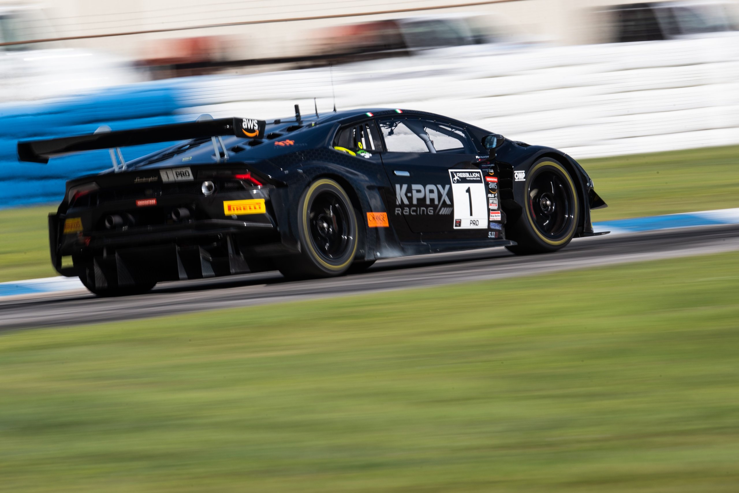 K-Pax Racing'S Sebring Sweep Clinches Back-To-Back Gt World Challenge America Titles For Lamborghini 7 Rear view of k-pax racing lamborghini huracán gt3 evo speeding away with visible rear wing and diffuser