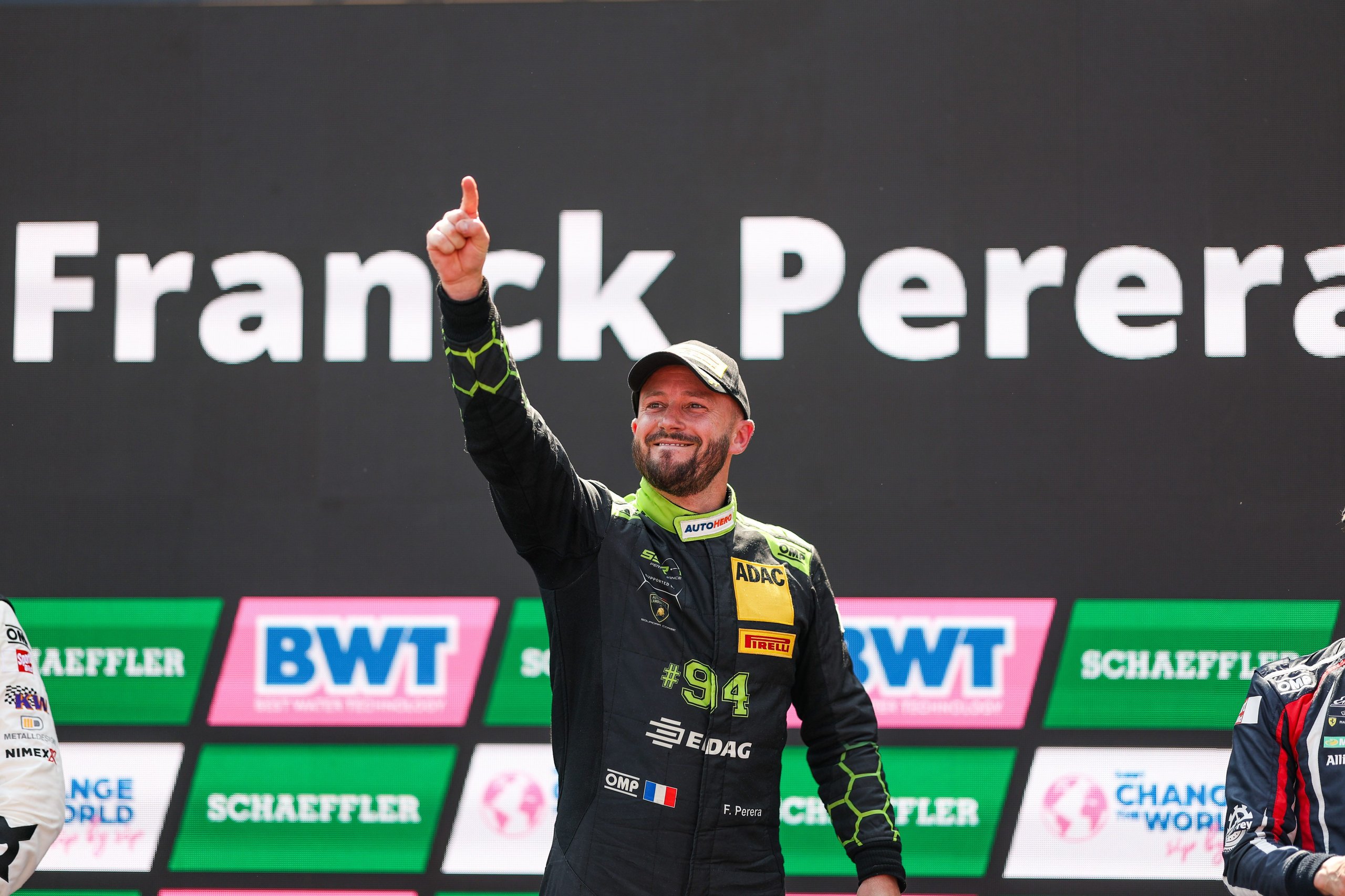 Franck perera celebrating on the dtm podium after winning at oschersleben