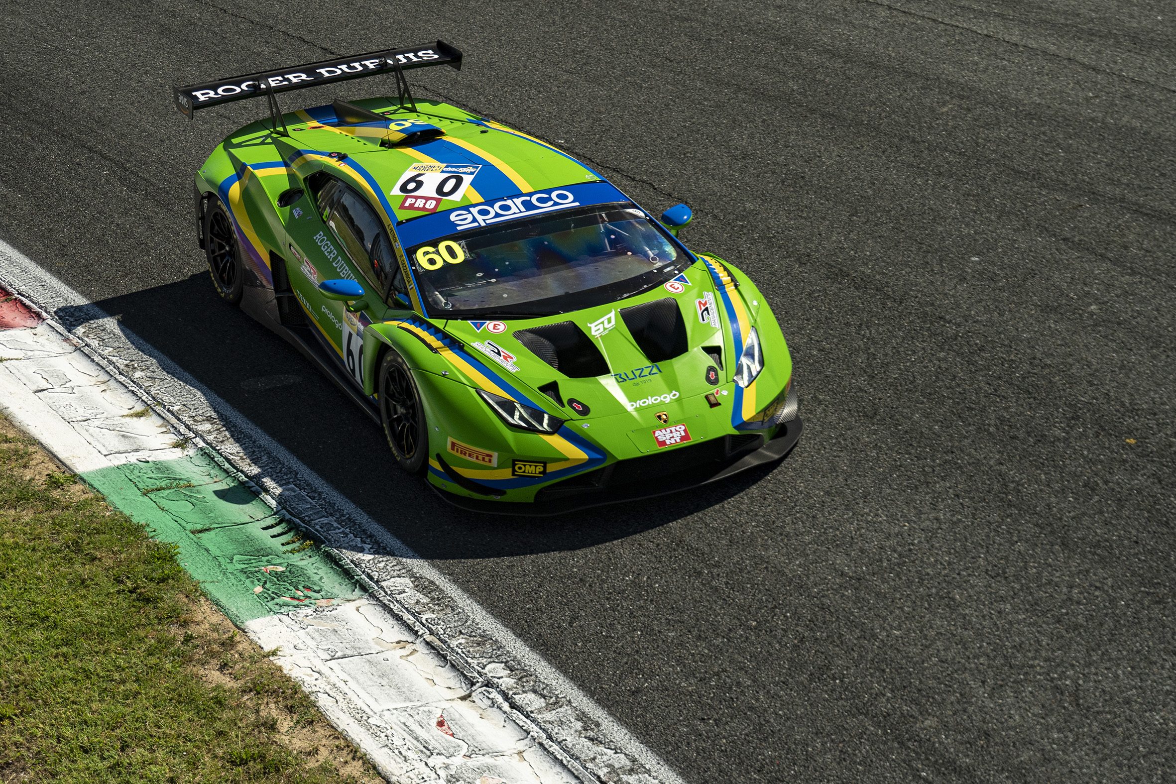 Huracán Gt3 Evo2 Wins On Debut At Monza, Proving Lamborghini'S Customer Racer Arrived Ready 7 Aerial view of the green lamborghini huracán gt3 evo2 on track showing its large rear wing and aerodynamic profile
