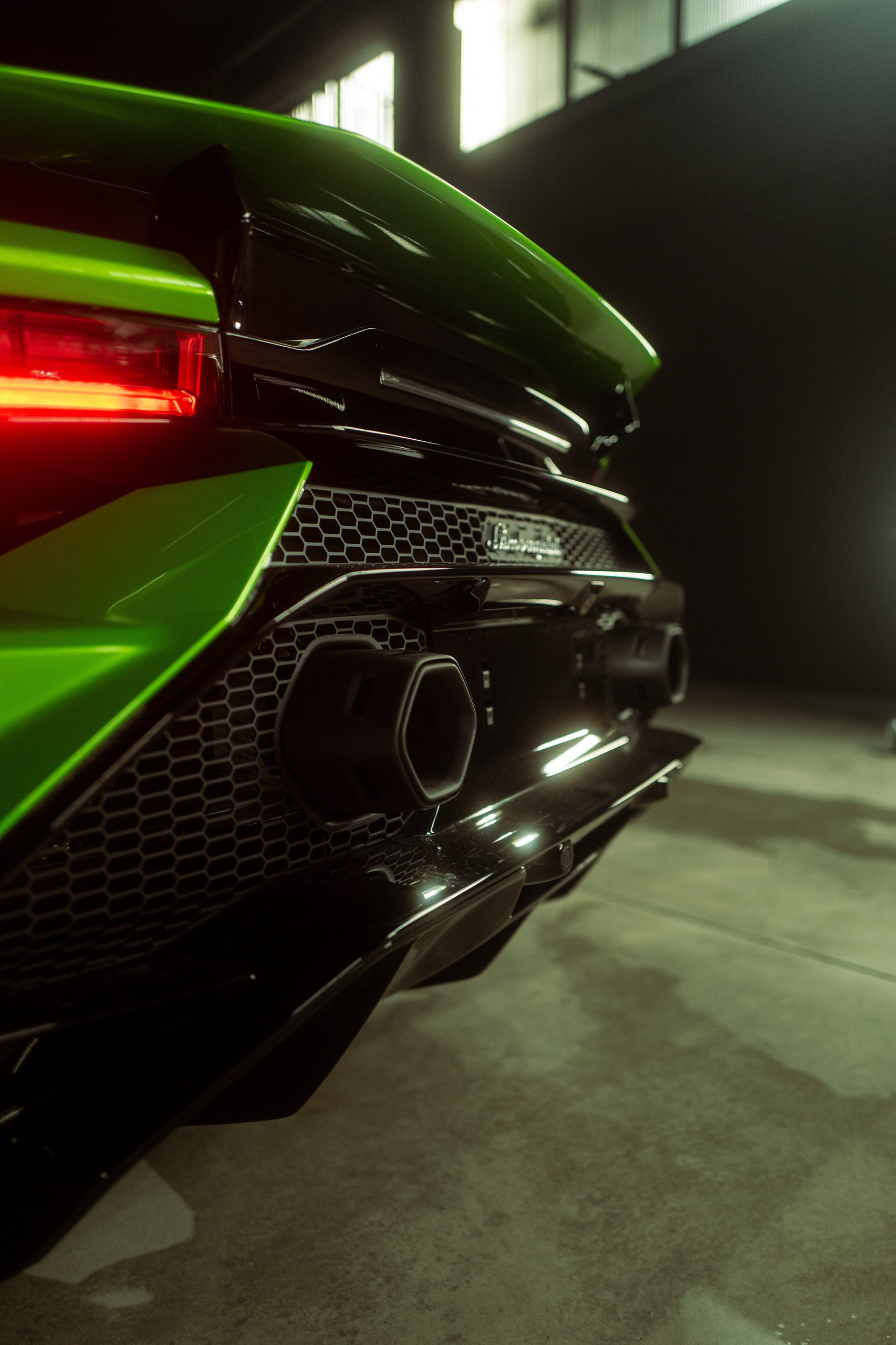 Huracán Tecnica: Lamborghini'S Case That The Best V10 Splits The Difference 5 Close-up of the huracán tecnica's rear showing hexagonal exhaust pipes, diffuser fins, and honeycomb grille detail