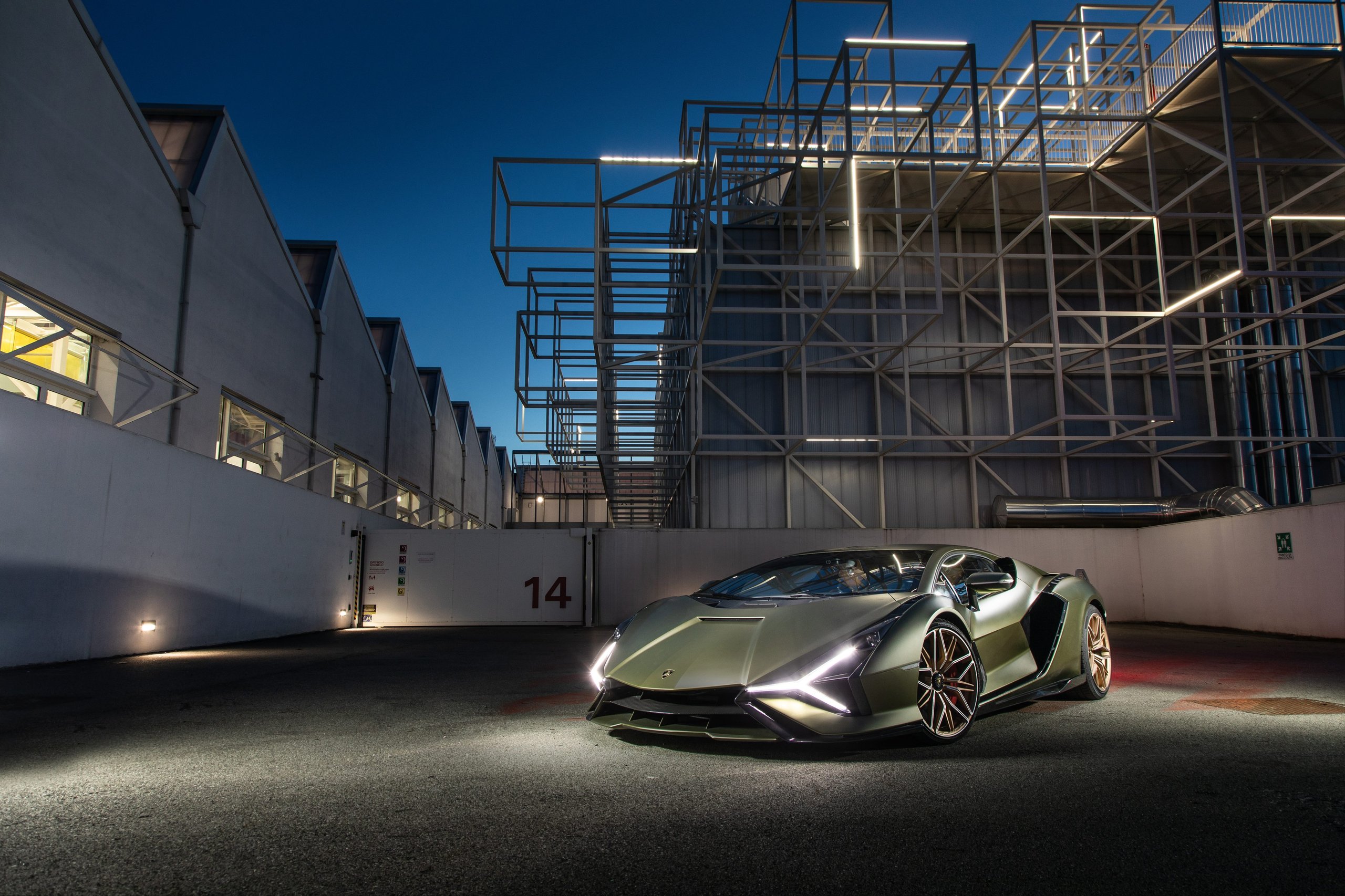 Lamborghini'S €1.8 Billion Gamble: Record 2021 Profits Fund The End Of Pure Combustion 3 Matte green lamborghini sián fkp 37 parked in an industrial setting at twilight