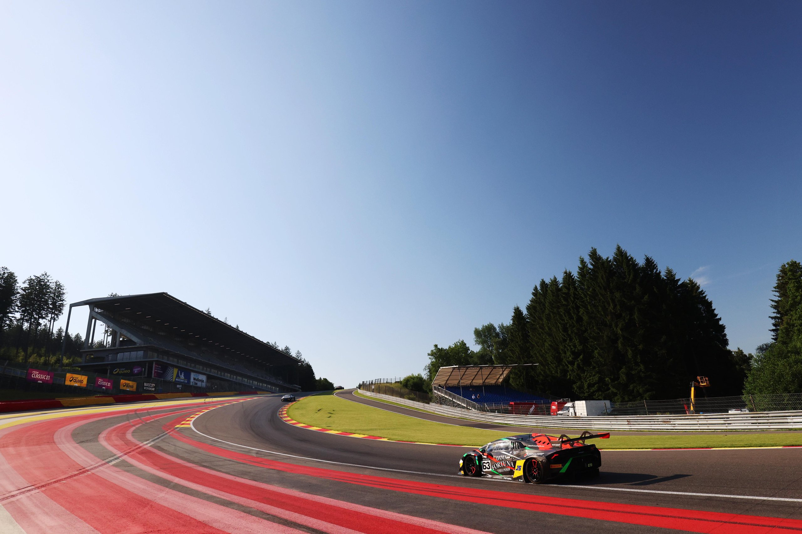 Barwell'S Huracán Gt3 Evo2 Conquers A 55-Car Spa Grid To Clinch British Gt Win Number 33 For Lamborghini 11 Lamborghini huracán gt3 evo2 number 63 racing on the wide spa-francorchamps circuit under clear blue sky