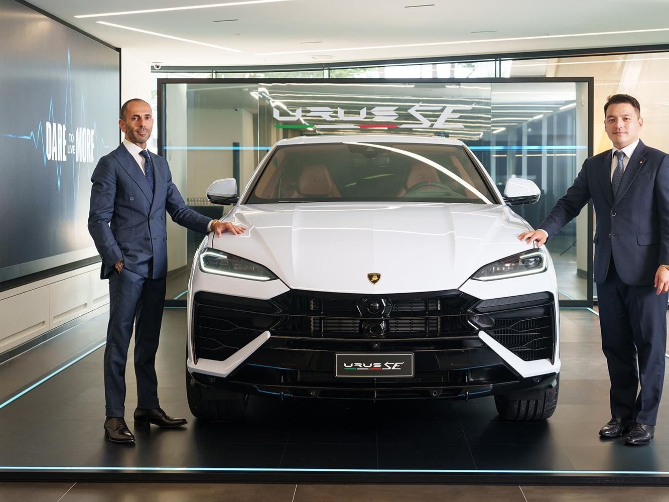 Lamborghini Bundang Puts The Urus Se On Stage For South Korea'S Tech Corridor 3 Two executives standing beside a white lamborghini urus se in the new bundang showroom