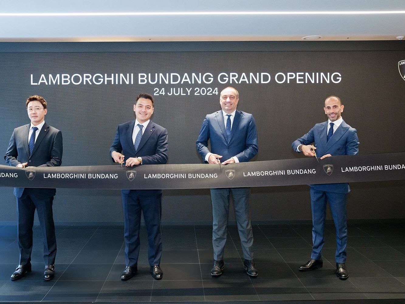 Lamborghini Bundang Puts The Urus Se On Stage For South Korea'S Tech Corridor 11 Four executives participating in the ribbon-cutting ceremony at the lamborghini bundang grand opening