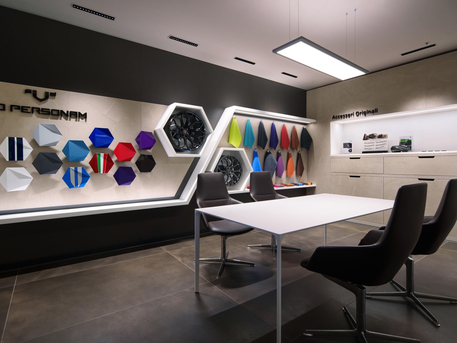 Lamborghini Bundang Puts The Urus Se On Stage For South Korea'S Tech Corridor 7 The ad personam customization studio at lamborghini bundang, showing color swatches, wheel options, and material samples arranged on display with a meeting table