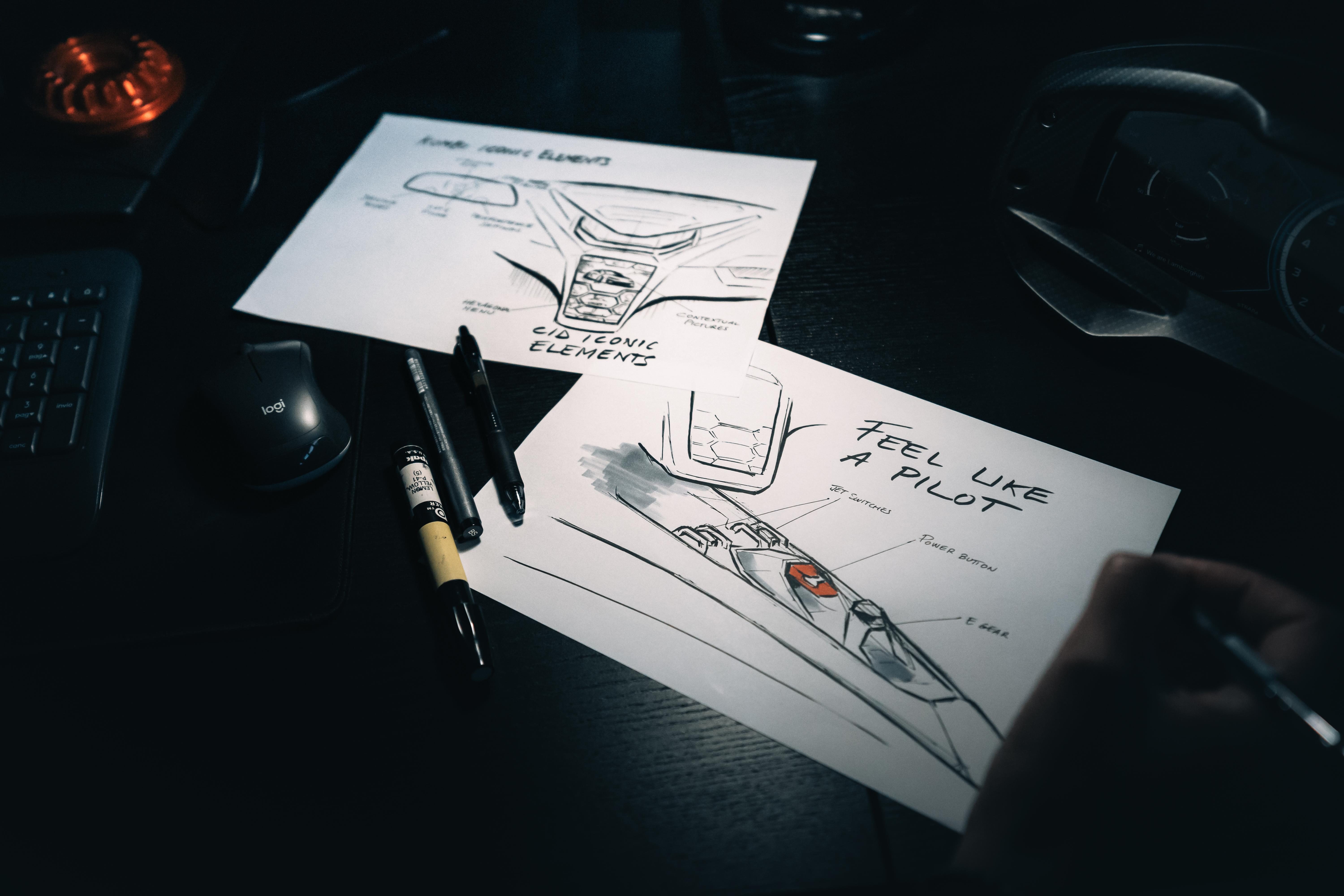 Centro Stile At 20: How Lamborghini'S 'Manifesto' Concept Maps The Next Two Decades Of Design 7 Close-up of lamborghini interior design sketches featuring hexagonal motifs and 'feel like a pilot' text