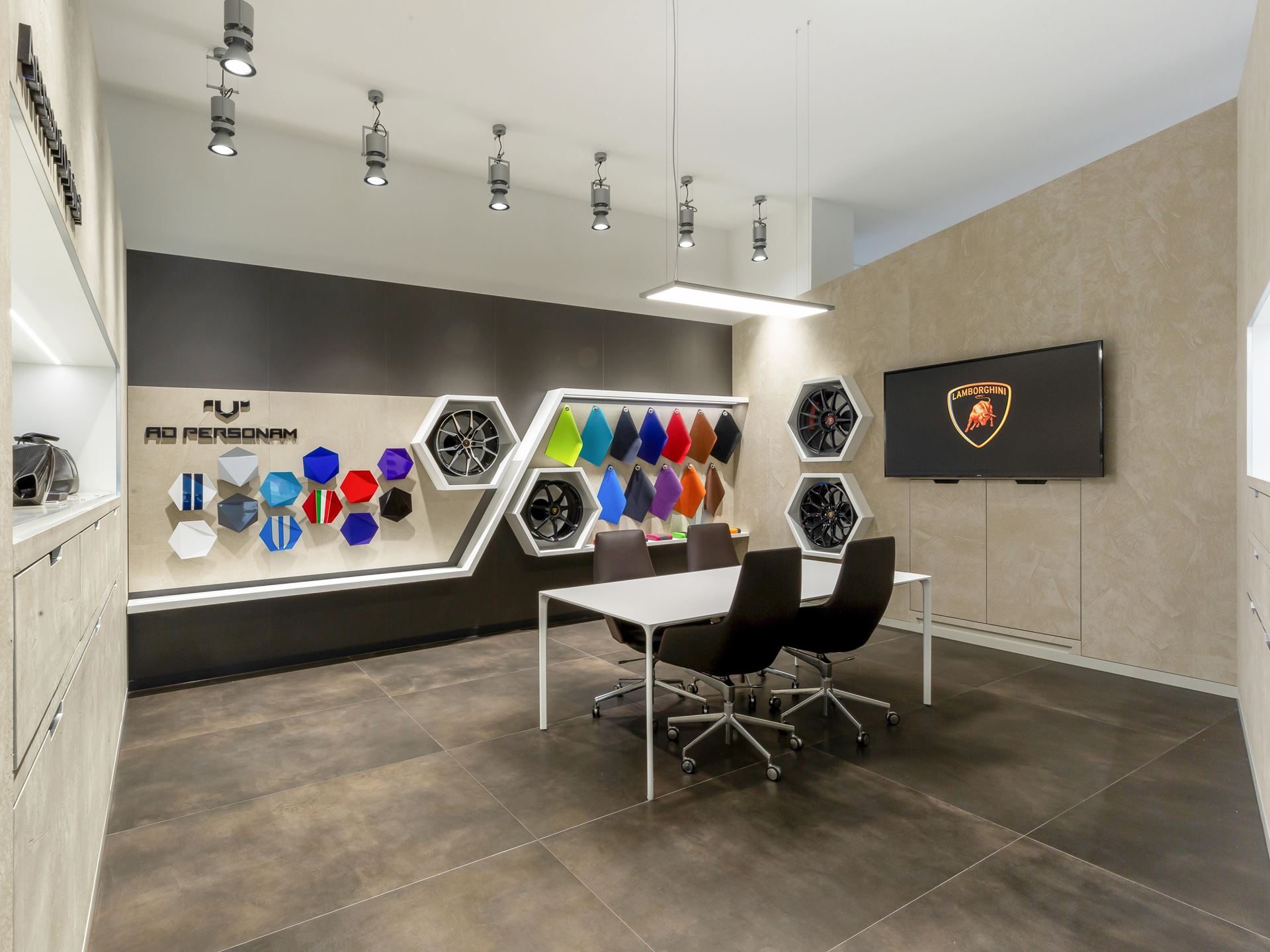 Lamborghini'S New Cologne Showroom Puts The Urus Se Center Stage For Germany'S Hybrid Era 5 Lamborghini ad personam customization area with material samples, wheel displays, and a consultation table inside the cologne dealership