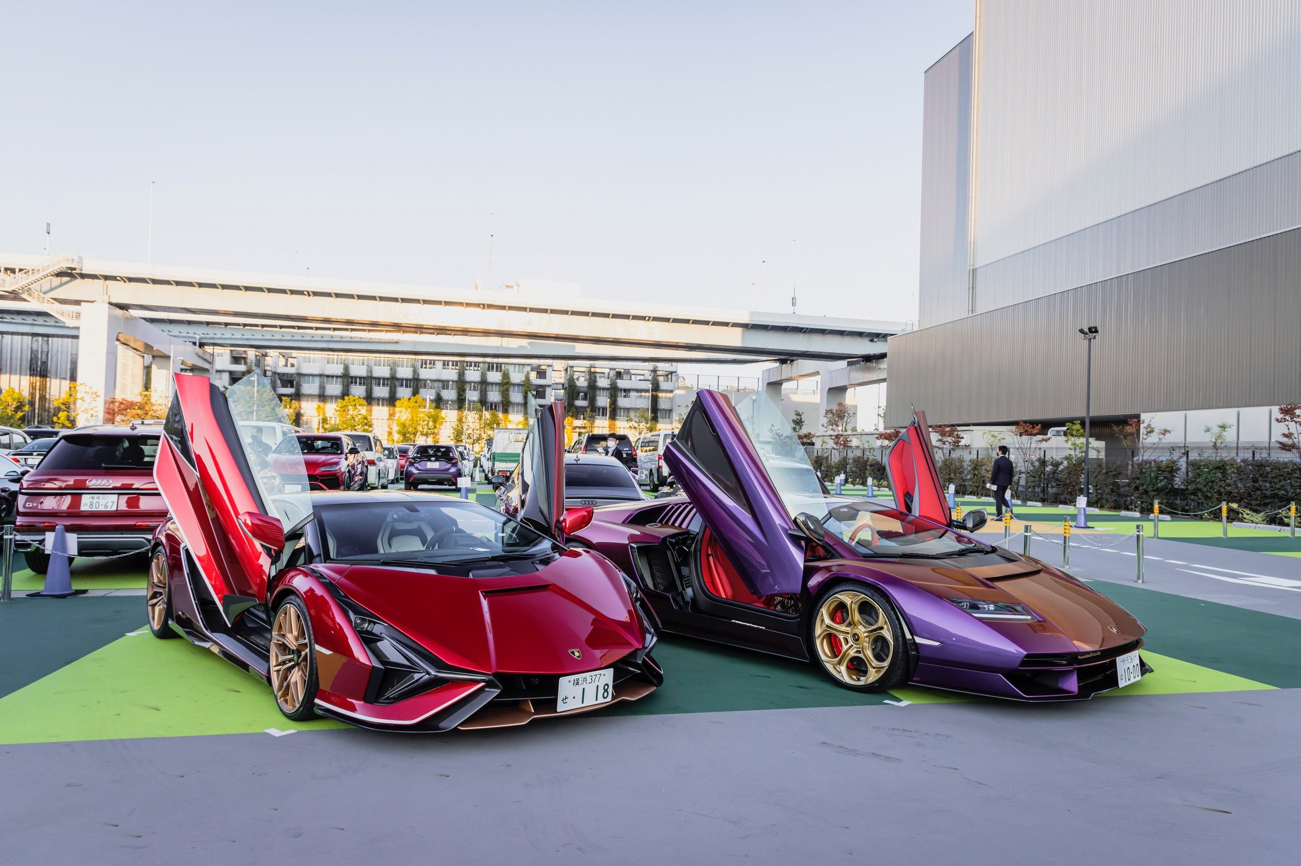 180 Lamborghinis Took Over Tokyo: What Lamborghini Day Japan 2022 Reveals About The Brand'S Asian Strategy 11 Red sián and purple countach lpi 800-4 with scissor doors open at outdoor event