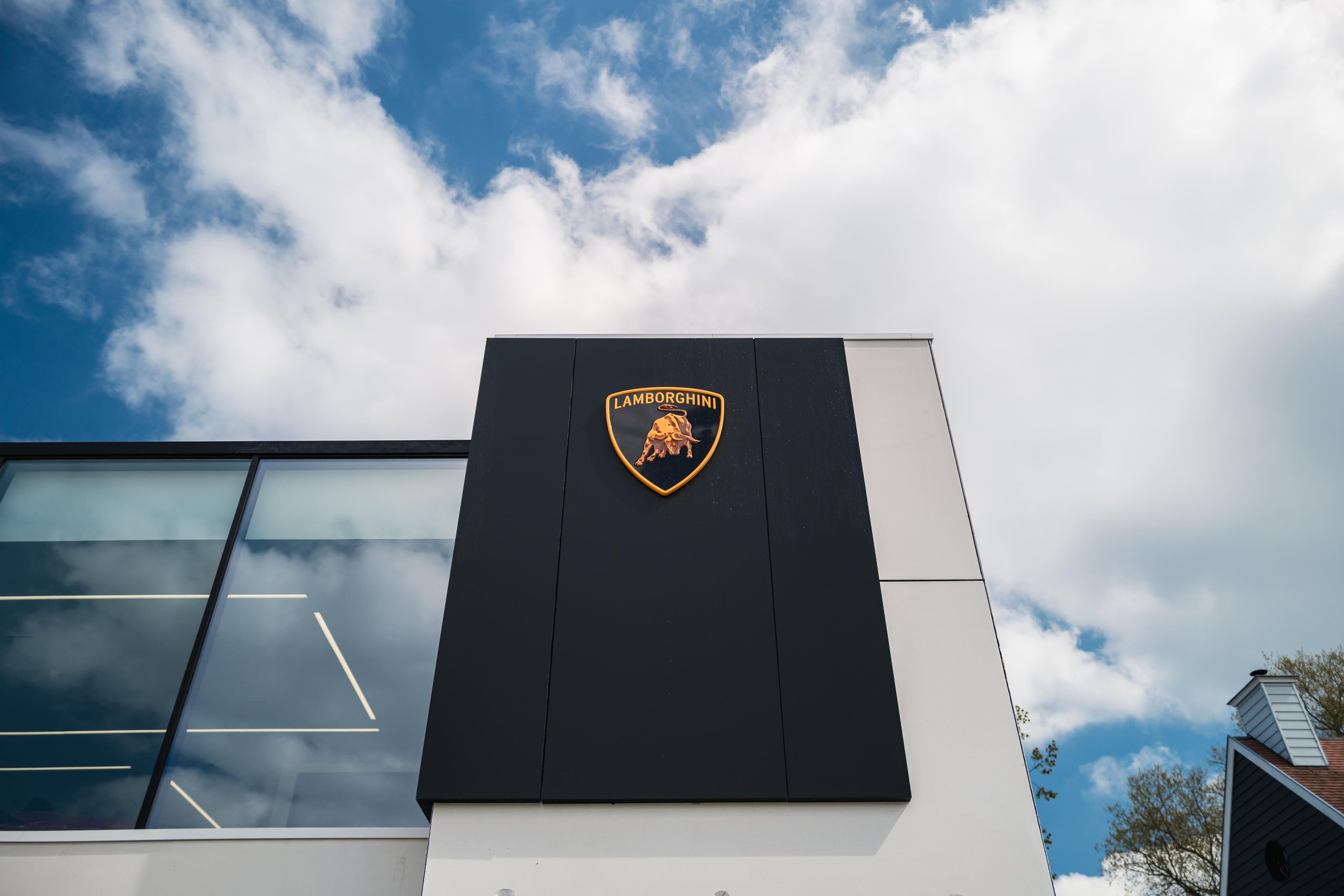 Lamborghini Plants Its Flag On Belgium'S Wealthiest Coastline With A New Knokke Showroom 5 The lamborghini shield logo displayed on the modern facade of the new knokke dealership building