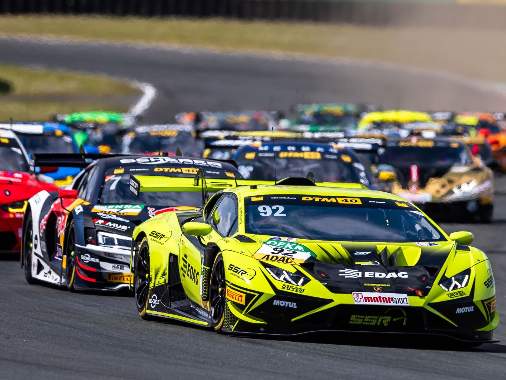 Engstler'S Three-Tenths Margin At Oschersleben Reveals Why The Huracán Gt3 Evo2 Still Bites 7 Mirko bortolotti's yellow #92 lamborghini huracán gt3 evo2 leading a pack of dtm cars on track