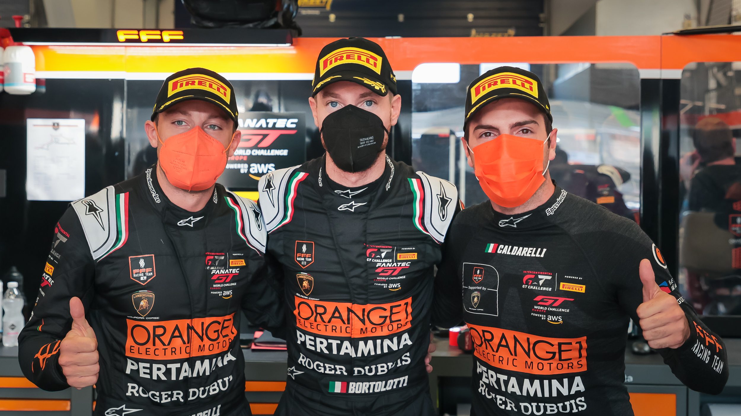 How Lamborghini'S 2021 Nürburgring Endurance Cup Win Built The Foundation For Its Gt3 Future 5 The three winning lamborghini factory drivers in black racing suits and pirelli caps posing in the pit garage at the nürburgring