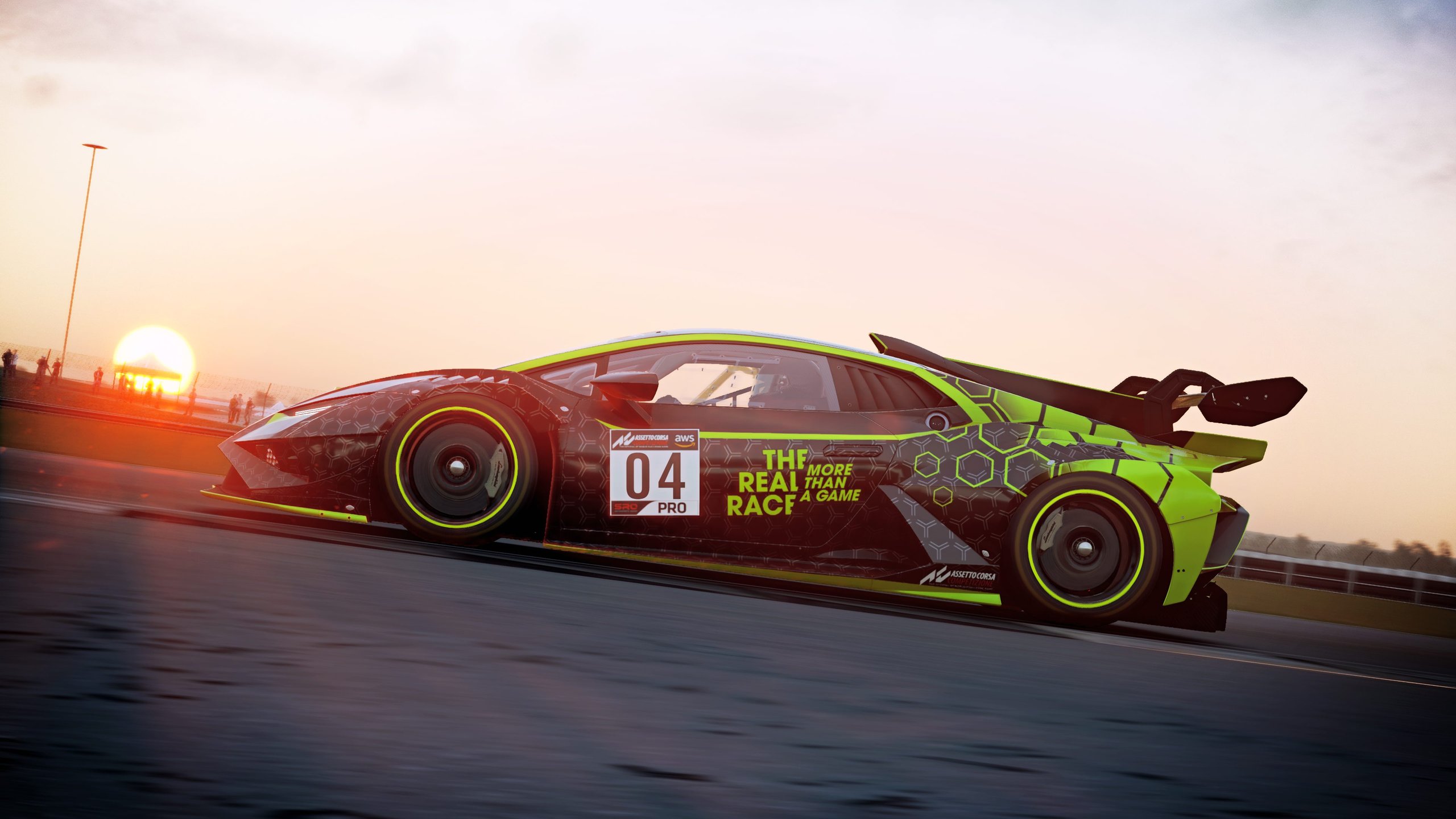 Lamborghini'S 'The Real Race' Offers Sim Racers A Factory Esports Seat, And That Changes The Talent Pipeline 9 Black and neon green lamborghini huracán gt3 evo race car speeding along a track at sunset
