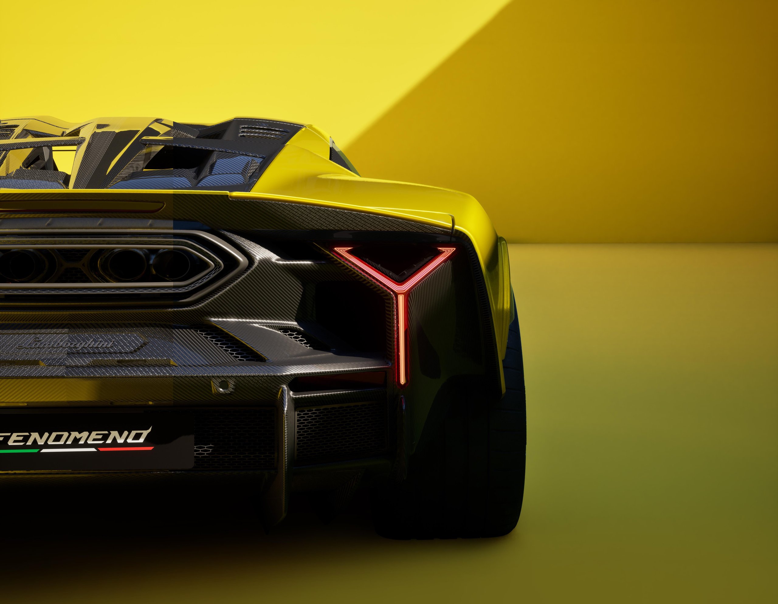 Lamborghini'S Fenomeno Wins Red Dot'S Highest Honor, And Its 'Hyper-Elegant' Design Tells Us Where The Brand Is Heading 5 Close-up detail of the fenomeno's rear showing y-shaped led taillight, exposed carbon fiber weave, and hexagonal exhaust tips