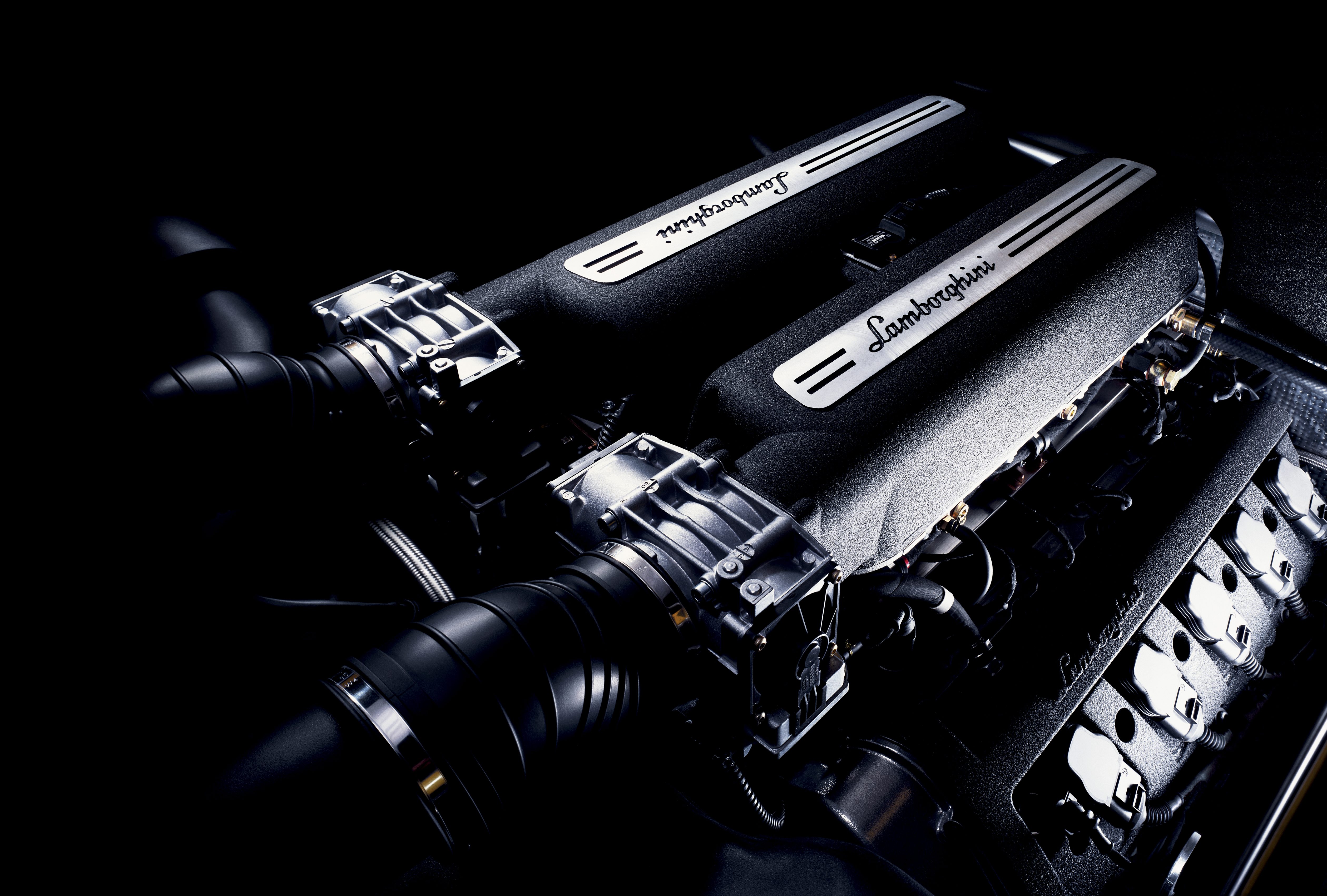 The Gallardo At 20: How Lamborghini'S First V10 Became The Blueprint For Every Modern Bull 5 Close-up of the lamborghini gallardo v10 engine showing intake manifolds and lamborghini branding