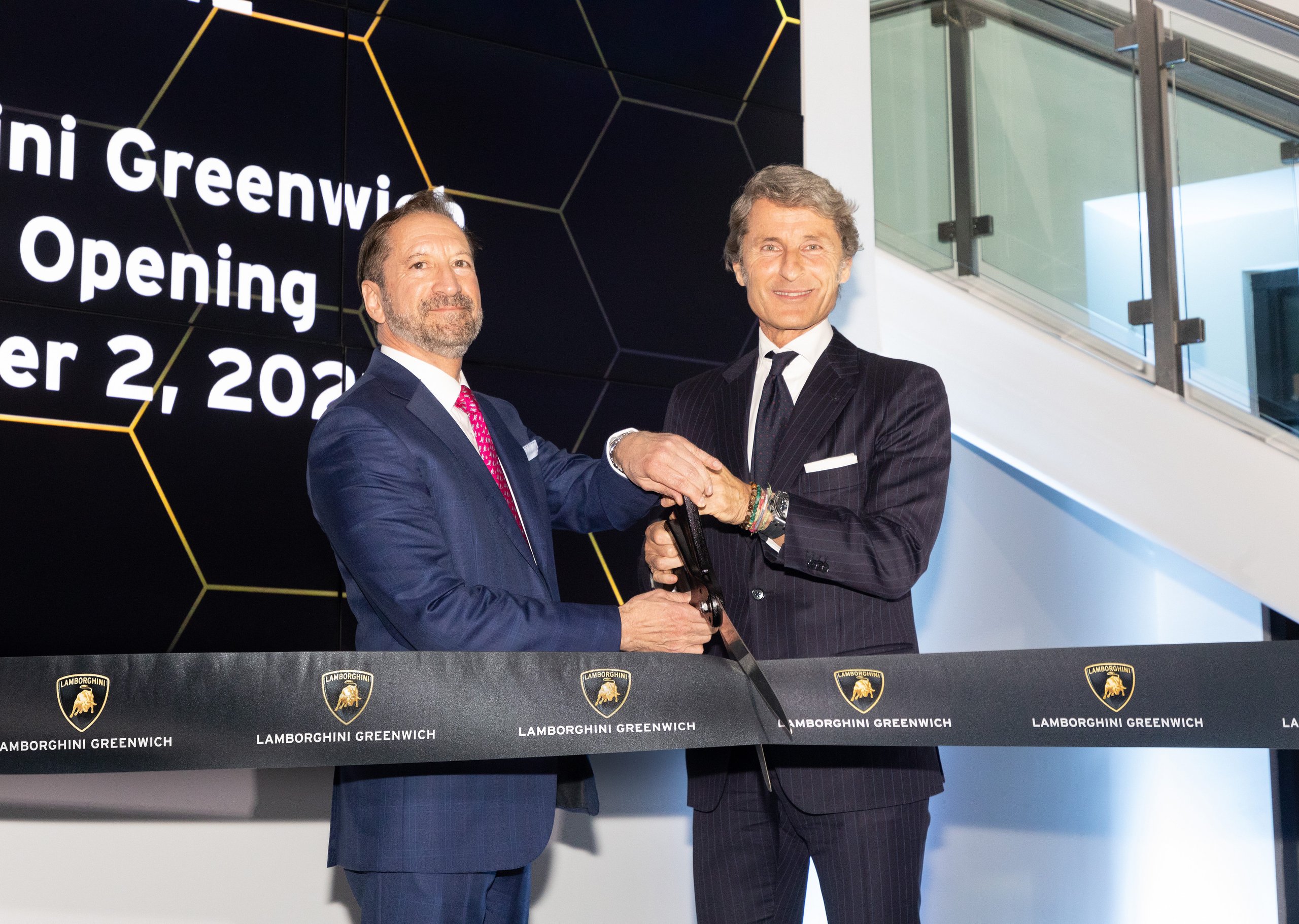 Lamborghini Greenwich Opens With A Proper Ad Personam Studio, And That Matters More Than The Ribbon Cutting 3 Stephan winkelmann and robert distanislao cutting the branded ribbon at the lamborghini greenwich grand opening ceremony
