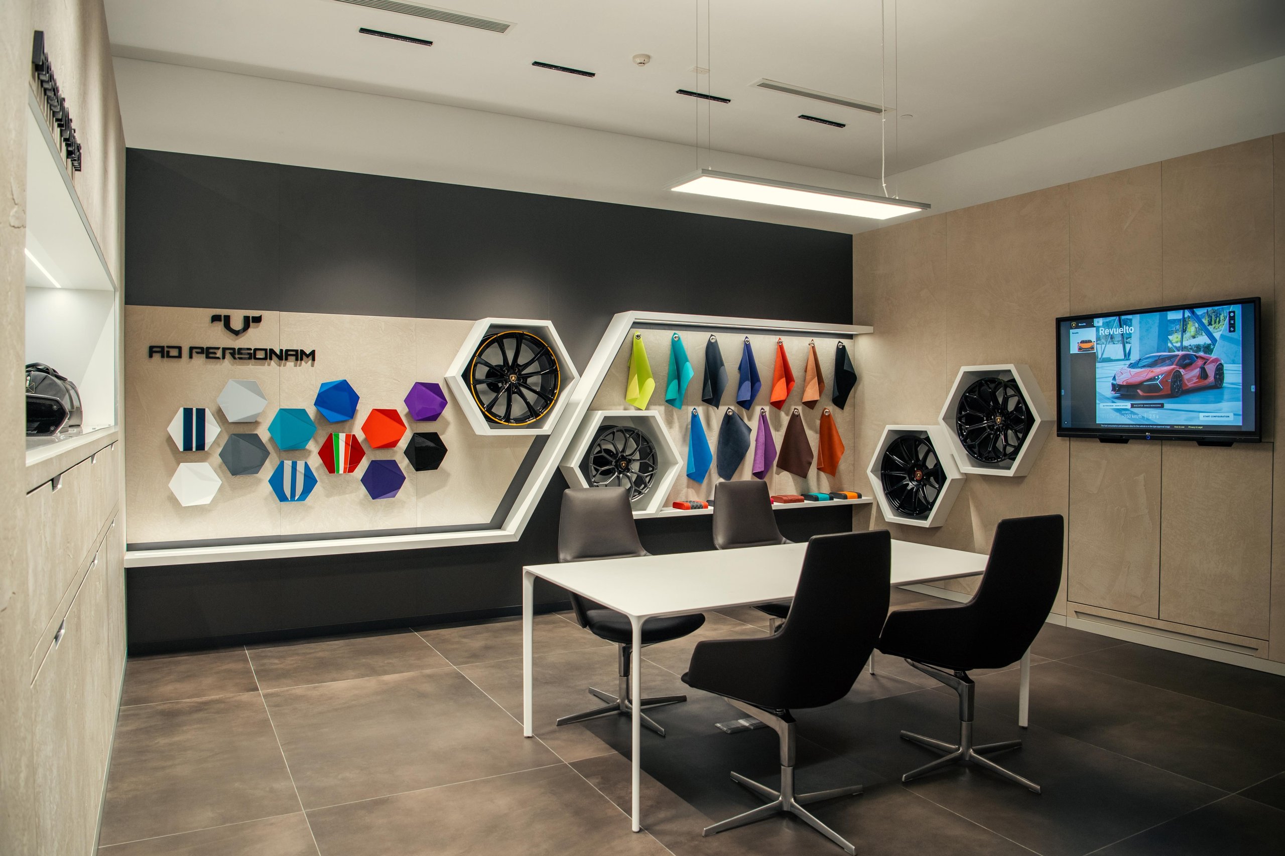 Lamborghini Plants Its Flag In Vietnam With A Ho Chi Minh City Showroom That Doubles As A 60Th Anniversary Statement 9 Interior view of the lamborghini ho chi minh city ad personam studio showing paint samples, wheel options, and interior material displays