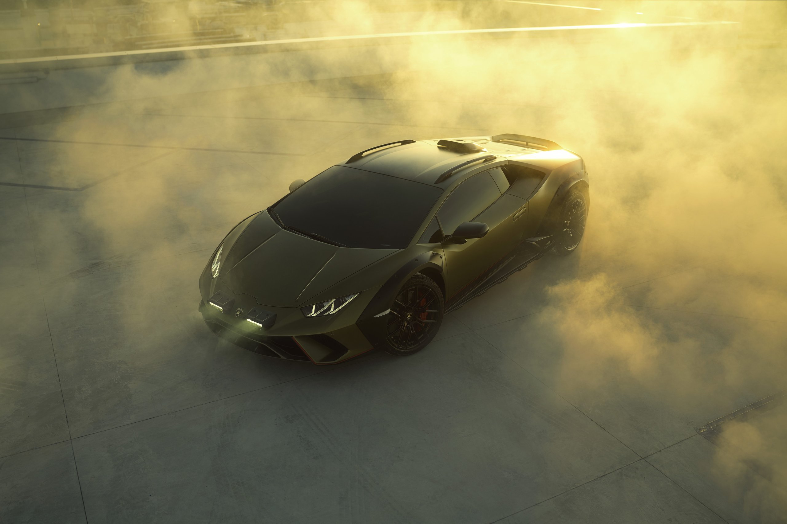 Huracán Sterrato: How Lamborghini'S V10 Off-Road Gamble Rewrites The Supercar Playbook 5 Aerial view of the lamborghini huracán sterrato on a rooftop, showing roof rails, fender flares, and elevated ground clearance