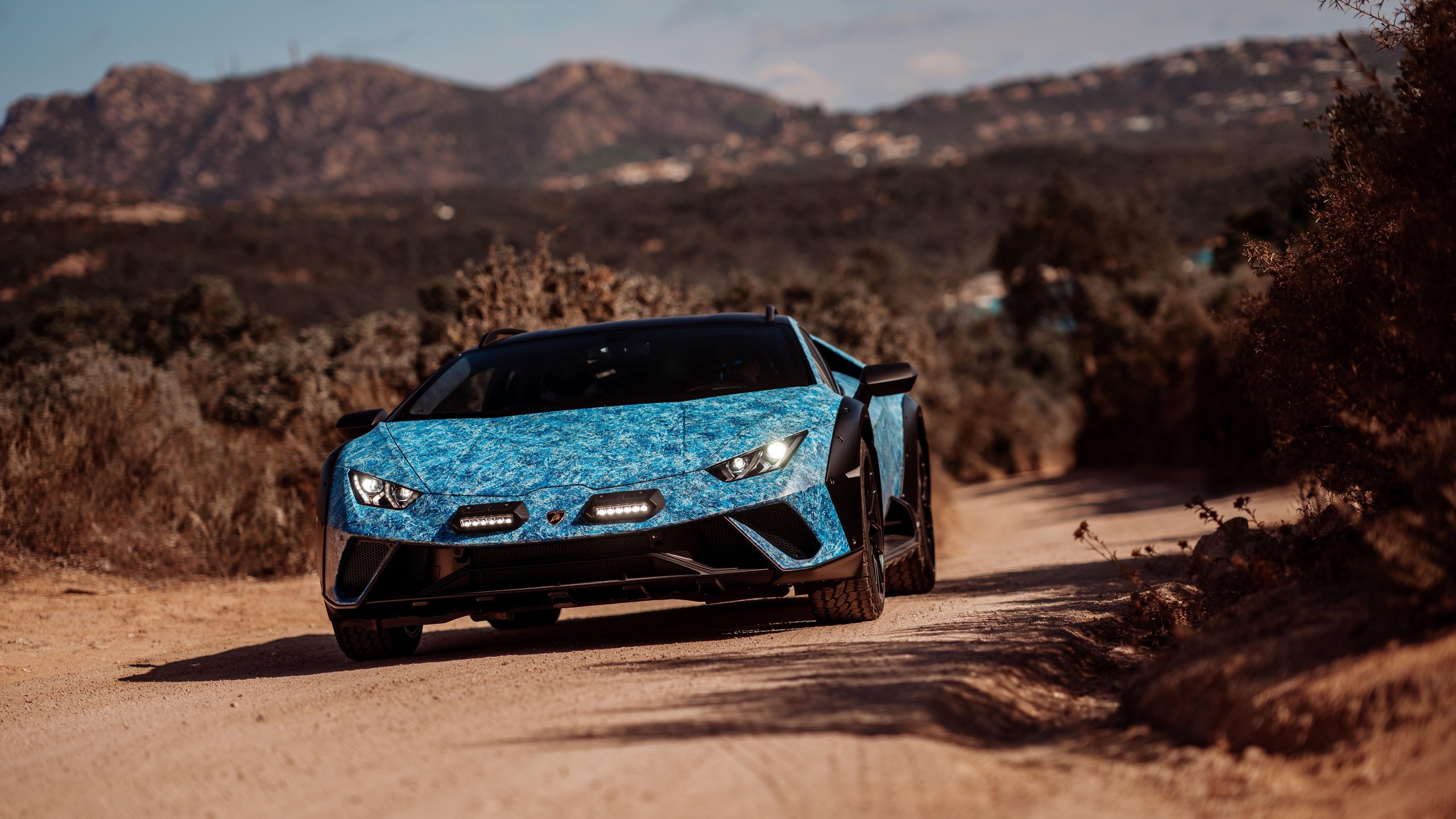 370 Hours Of Blue: How Lamborghini'S Opera Unica Sterrato Turns Paint Into Philosophy 15 Lamborghini huracan sterrato opera unica blue draft 0da1549d action 007 scaled