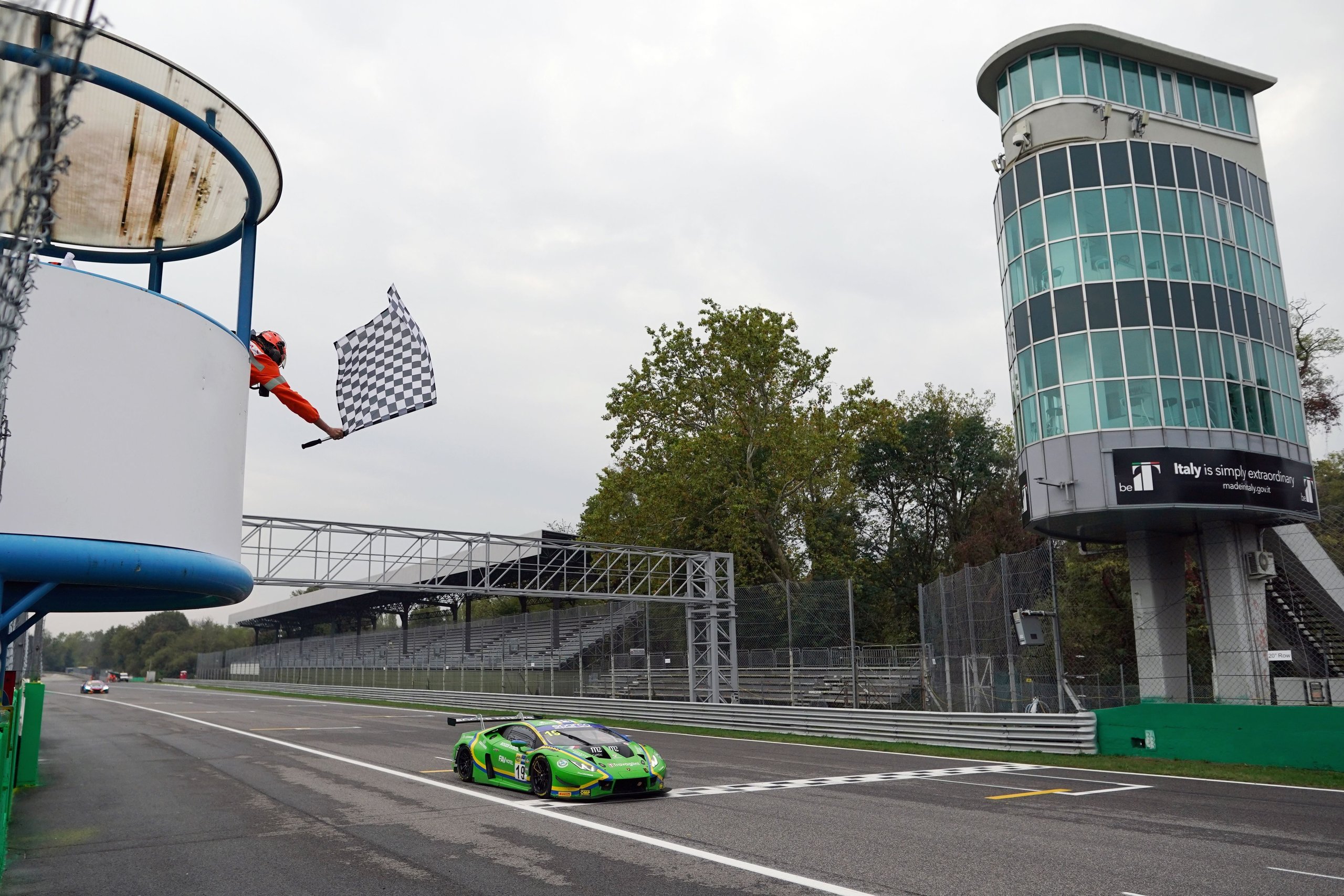 A Gearbox Failure, A One-Point Margin, And Lamborghini'S Third Italian Gt Title In Five Years 3 The #19 lamborghini huracán gt3 evo crosses the finish line under the checkered flag at monza