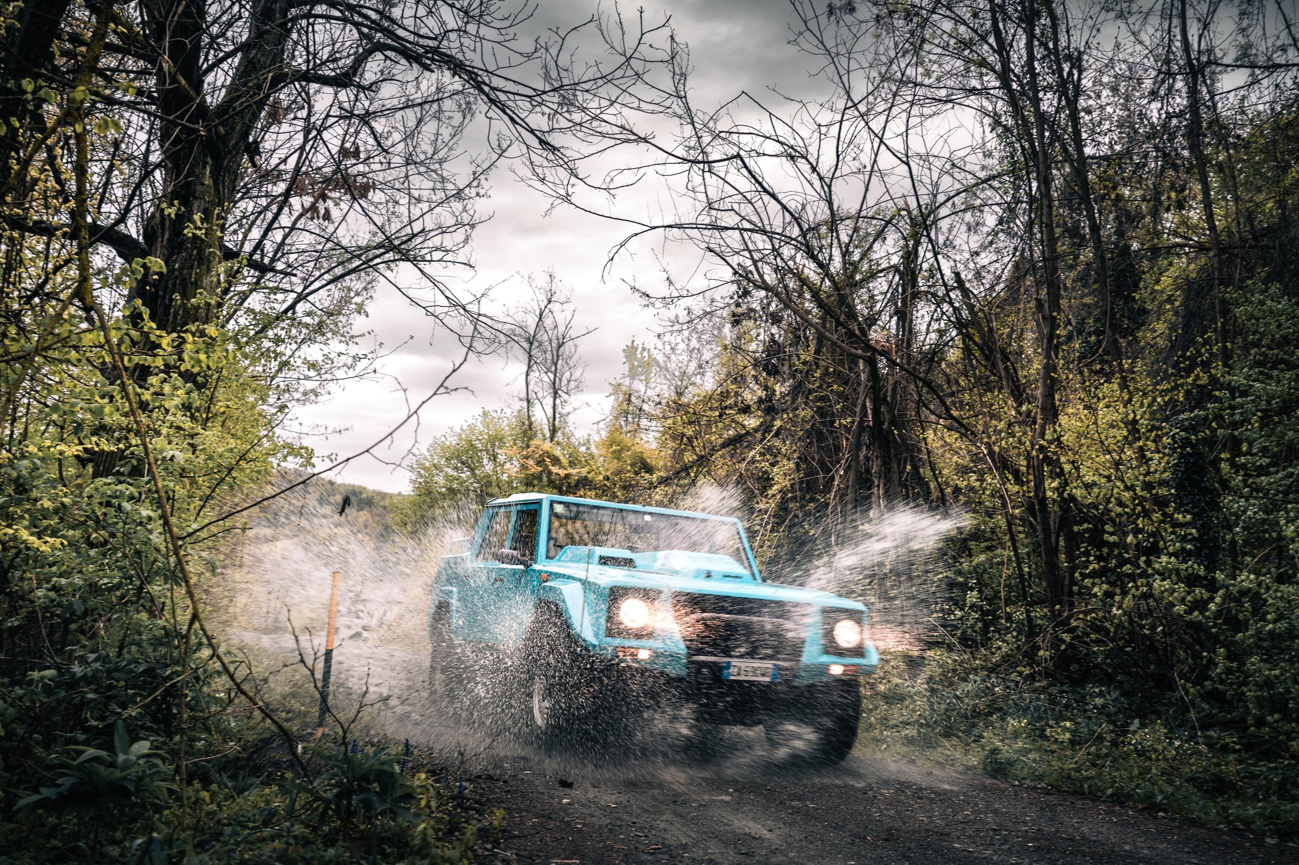 The 'Rambo Lambo' At 40: How Lamborghini'S V12 Off-Roader Invented The Super Suv And Paved The Road To The Urus 17 Lamborghini lm002 40th anniversary super suv draft 0efcd8ec action 008 scaled