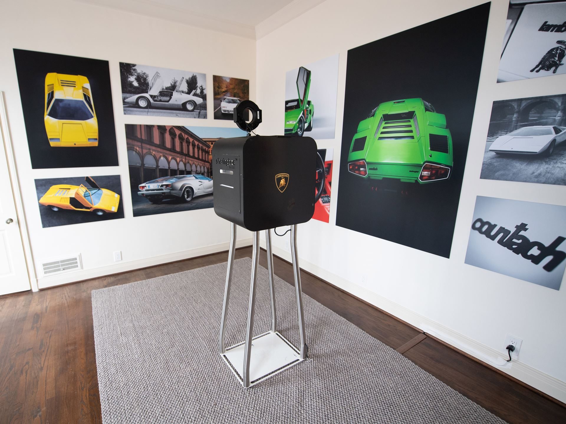 Inside Lamborghini'S Pebble Beach Playbook: How The Lounge Monterey Sells A Lifestyle, Not Just Supercars 7 Indoor countach legacy suite at the lamborghini lounge monterey with framed images of historic countach models and a branded photo booth