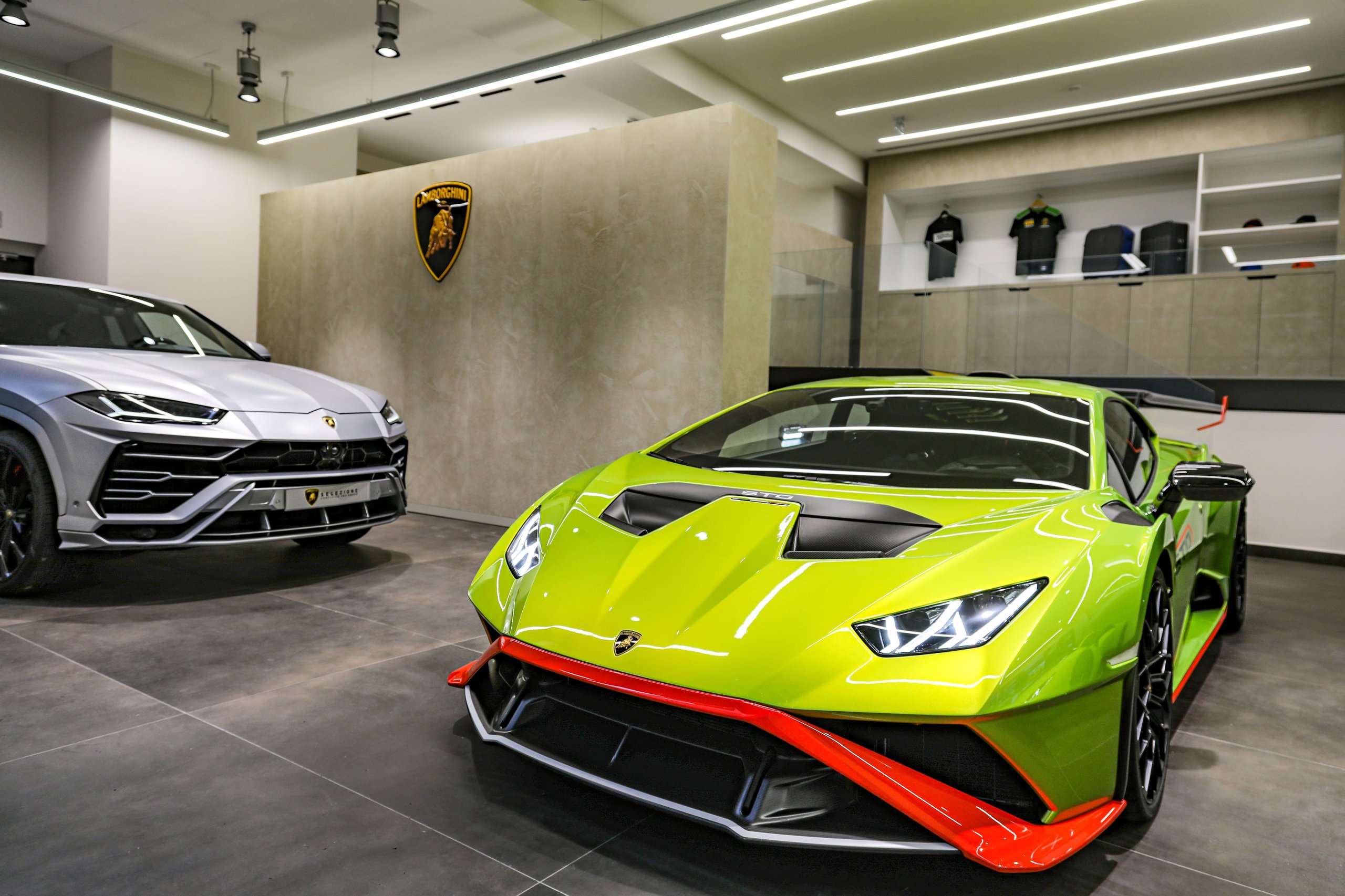 Lamborghini Monaco: How A 218-Square-Meter Showroom Became The Brand'S Riviera Calling Card 11 Green lamborghini huracan sto and grey lamborghini urus displayed together in the modern monaco showroom