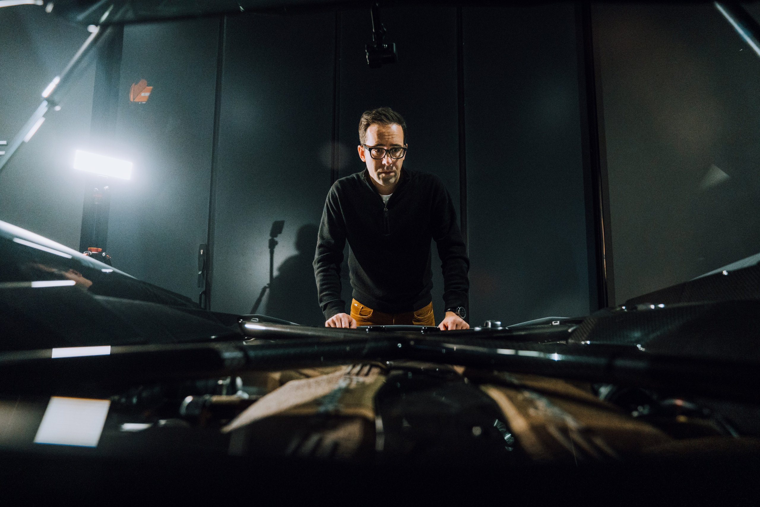 Lamborghini'S 'Space Time Memory' Nft Paired Iss Carbon Fiber With An Exploded Ultimae, And Five Buyers Paid $660K For The Concept 3 Fabian oefner standing over an open aventador ultimae engine bay, studying the v12 components during the space time memory project