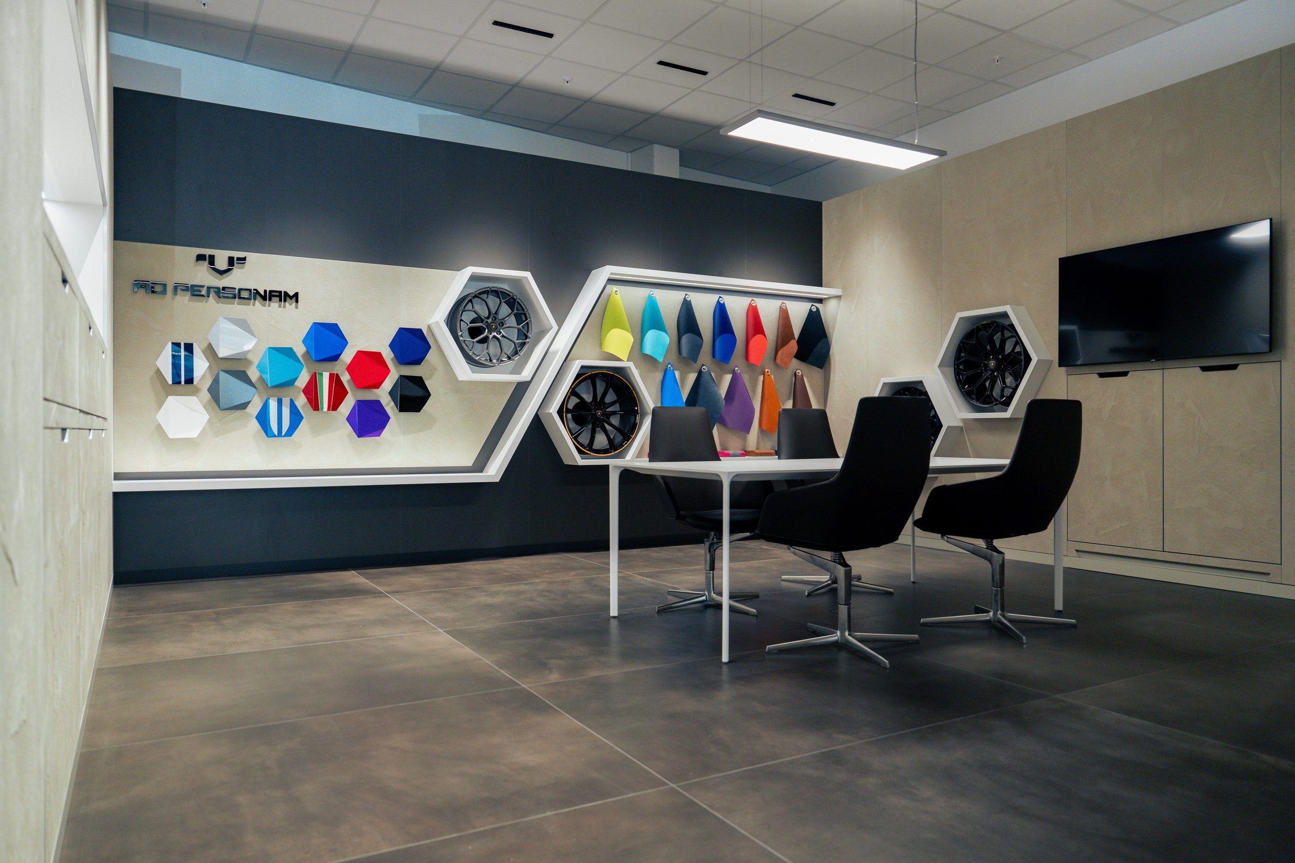 Lamborghini Oslo: Why Norway'S First Showroom Paired A V12 Hybrid Flagship With Frank Sinatra'S Miura 5 Lamborghini ad personam studio showing wheel options, paint swatches, leather samples, and a meeting table