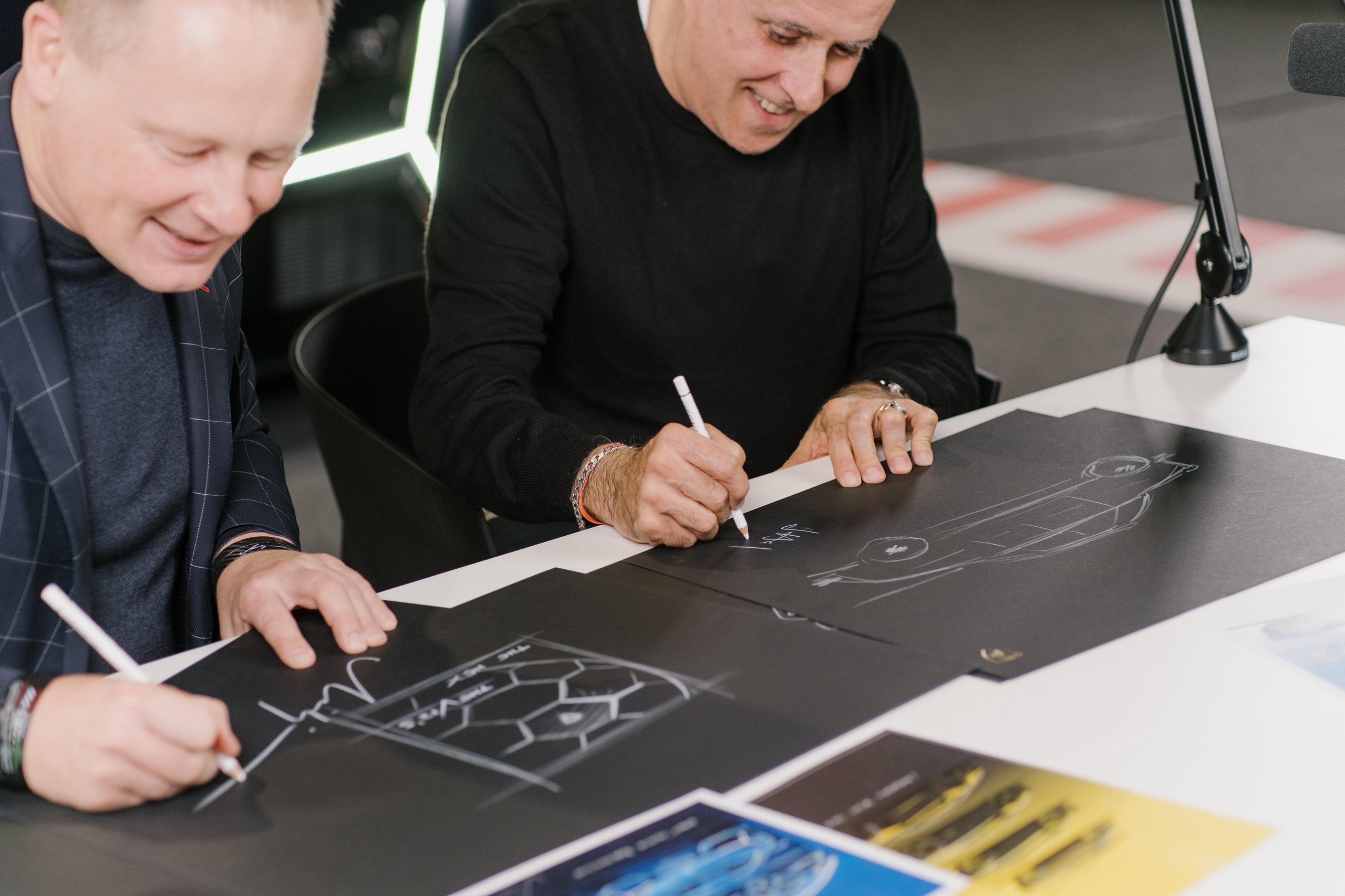 Lamborghini'S Design Chief Reveals How Depeche Mode And Vinyl Sleeves Shaped The Cars You Want To Buy 9 Mitja borkert and simon halfon drawing design sketches on black paper with white pens