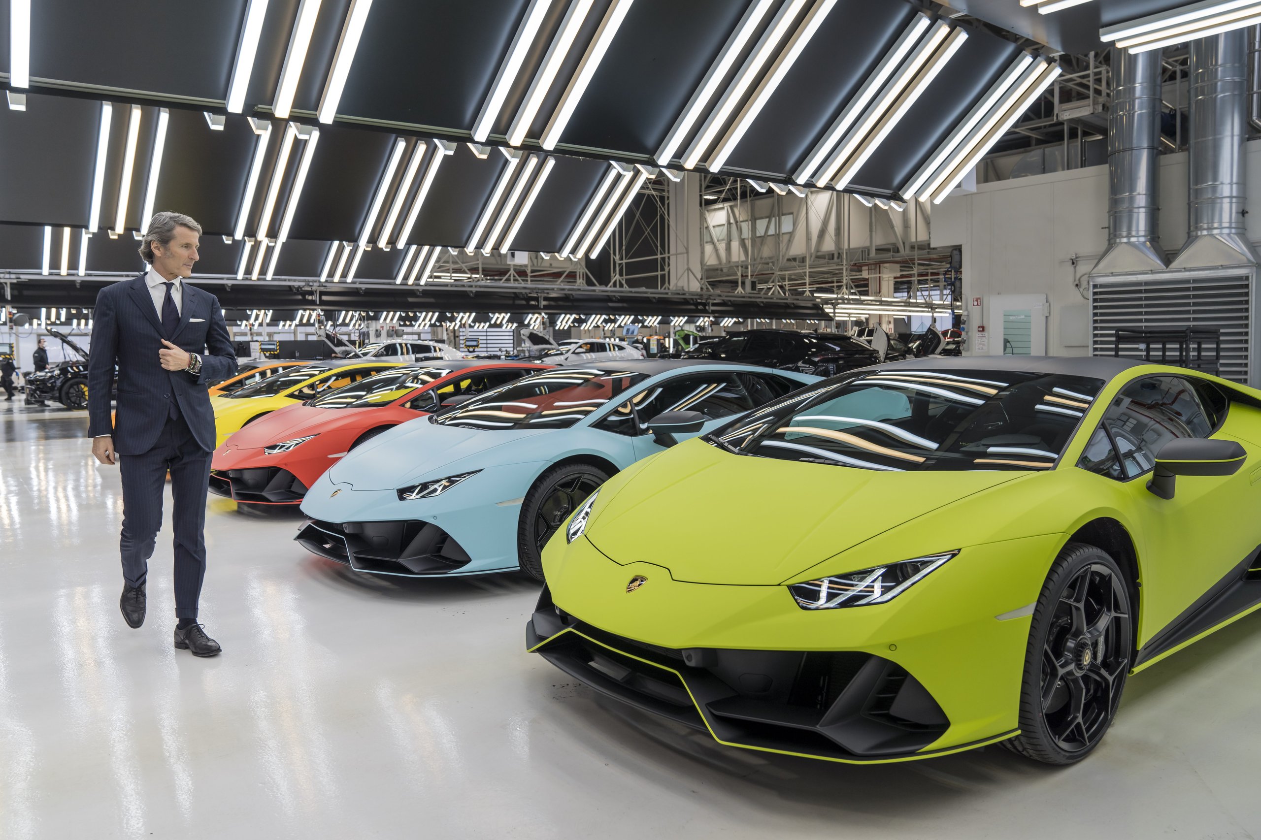 Lamborghini'S 12-Month Backlog Tells The Real Story Behind Its Best Quarter Ever 3 Stephan winkelmann walks past a colorful row of lamborghini huracán models on the factory floor