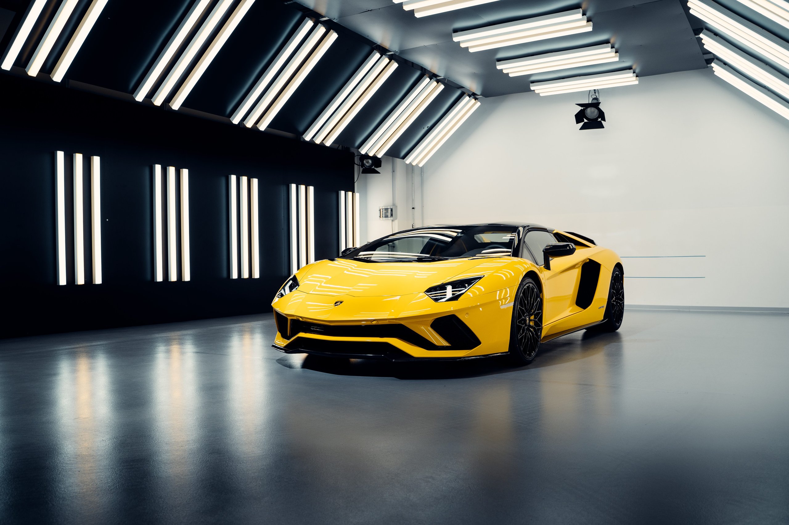 Lamborghini'S 12-Month Backlog Tells The Real Story Behind Its Best Quarter Ever 7 Yellow lamborghini aventador ultimae in a modern studio with dramatic lighting