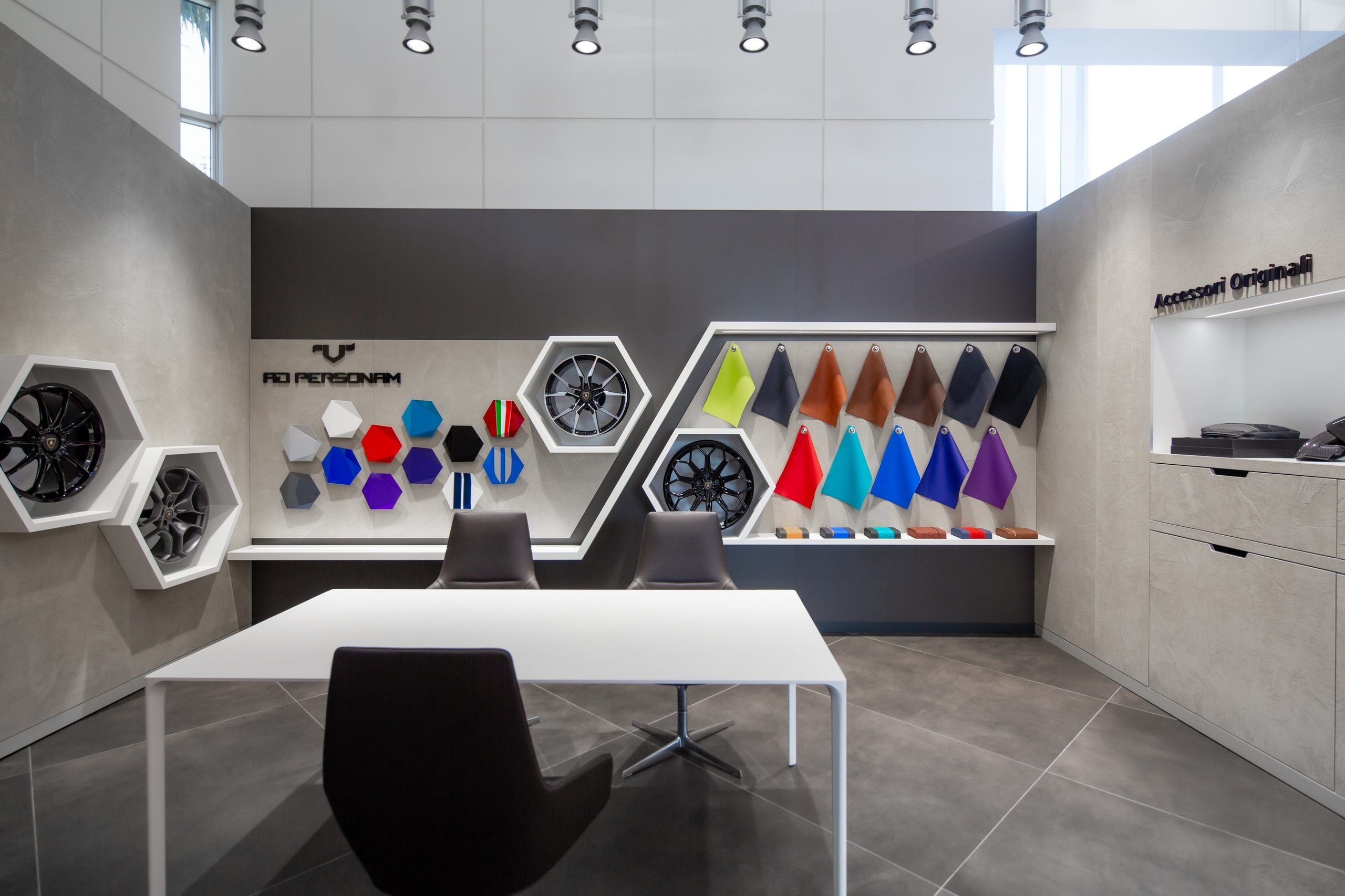 California And Florida Drive Lamborghini'S Record 2022 U.s. Sales As Two Showrooms Debut A New Retail Identity 5 Lamborghini ad personam customization studio with hexagonal paint samples, wheel displays, leather swatches, and a consultation table
