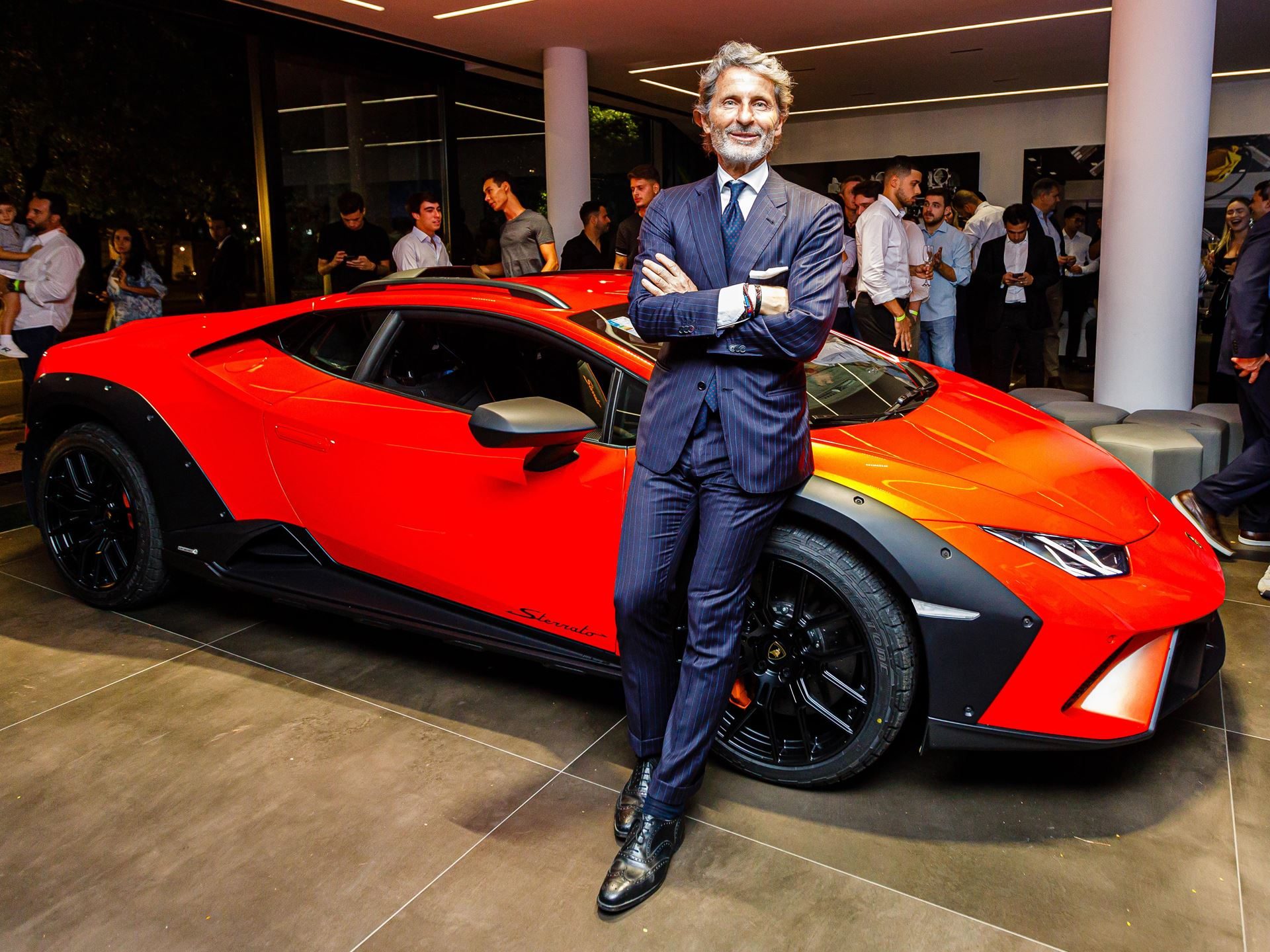 Lamborghini Opens Its First São Paulo Showroom With The Sterrato'S South American Debut, Laying The Ground For A Hybrid Future 5 Stephan winkelmann poses next to a red huracán sterrato at the são paulo showroom opening
