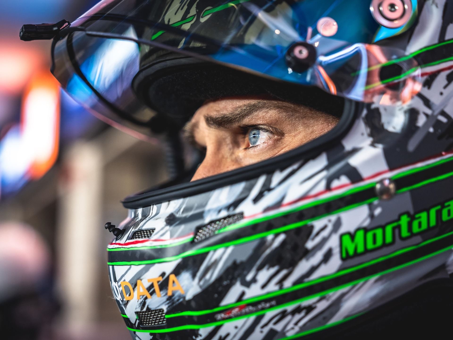 Lamborghini Sc63 Heads To Le Mans Carrying Points, Progress, And One Cracked Axle 9 Close-up of a race car driver's focused eyes through a decorated racing helmet visor