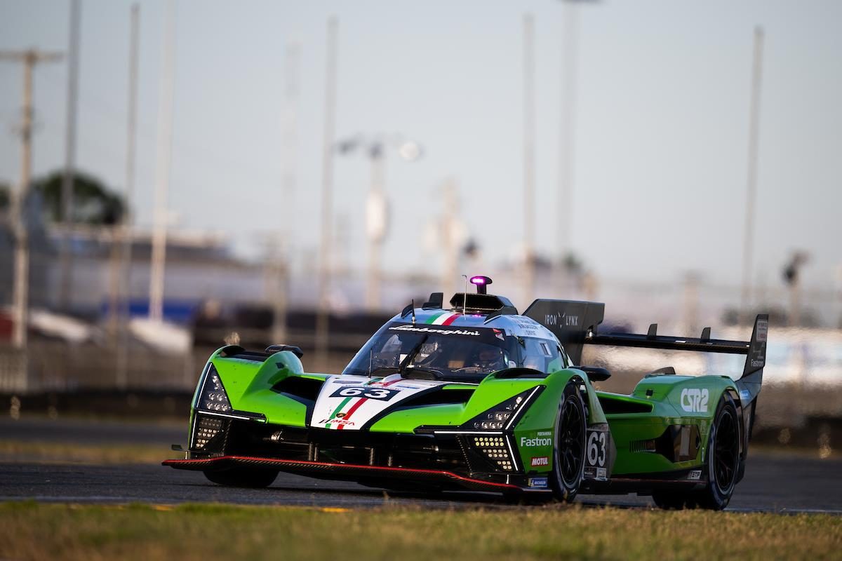 The Sc63 Topped Daytona'S Time Sheets, Then Learned What Lmdh Really Costs 5 Lamborghini sc63 navigating a turn at daytona in its green racing livery
