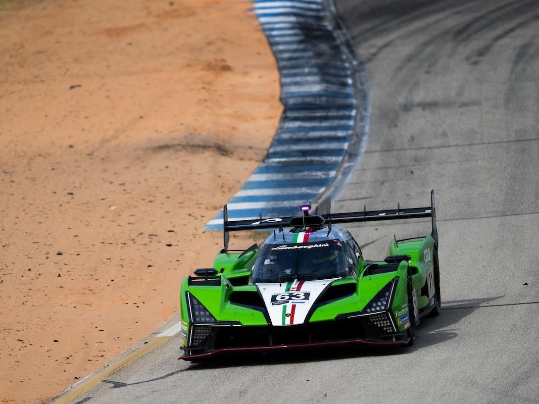 The Sc63'S Sebring Seventh: Why Finishing On The Lead Lap Mattered More Than The Position 3 The lamborghini sc63 cornering hard at sebring with blue and white curbing and sandy runoff visible