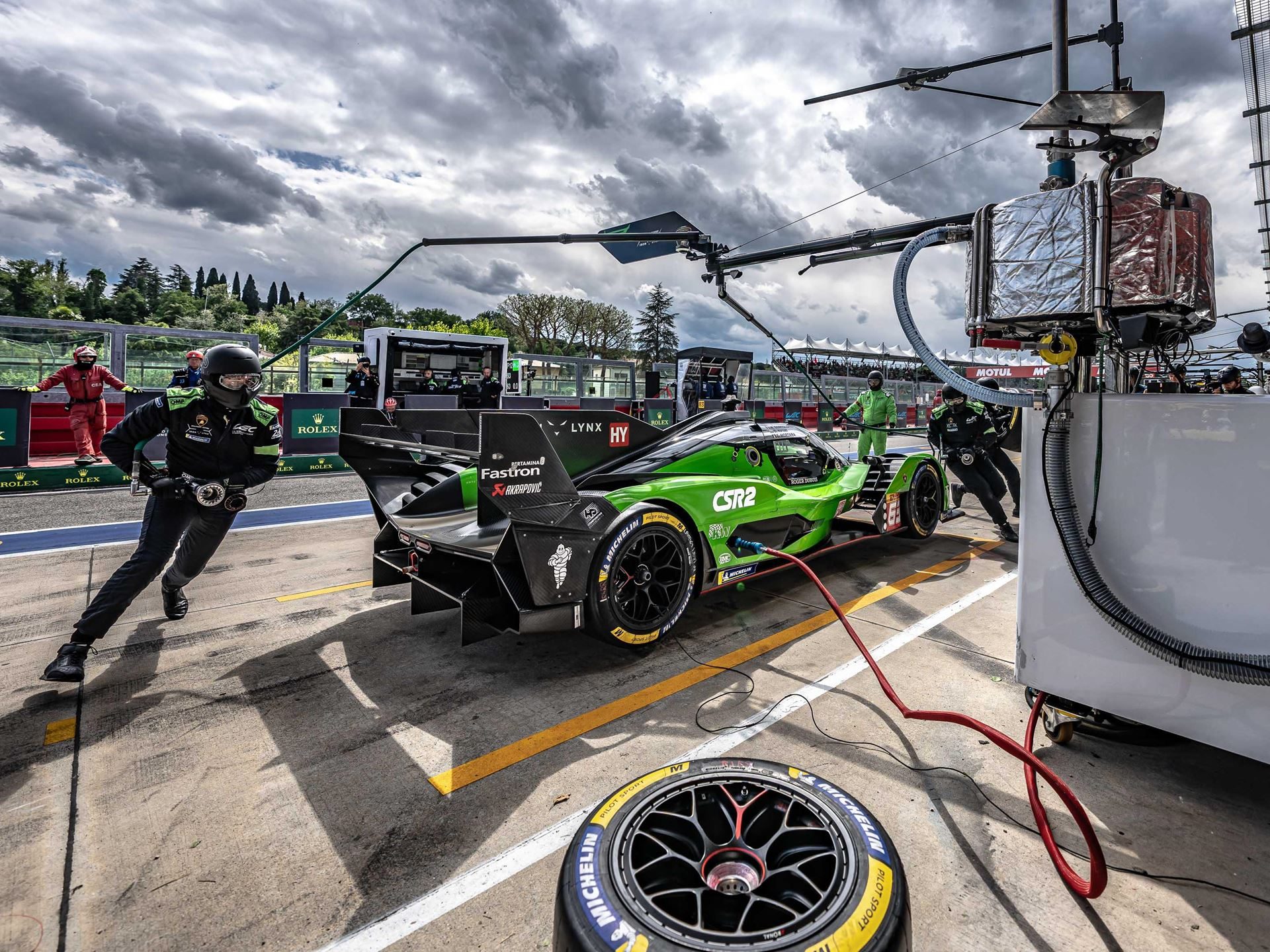 Lamborghini Sc63 Faces Its Final Exam At Spa Before Le Mans 5 Lamborghini sc63 during a pit stop with crew members working around the car and a tire visible in the foreground