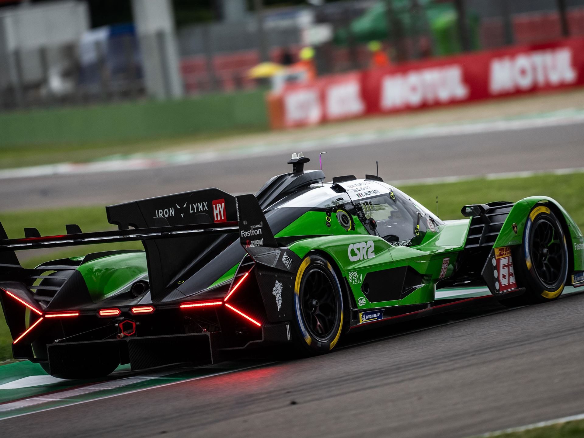 Lamborghini Sc63 Faces Its Final Exam At Spa Before Le Mans 9 Rear three-quarter view of the lamborghini sc63 showing its large rear wing, diffuser, and distinctive taillights on track