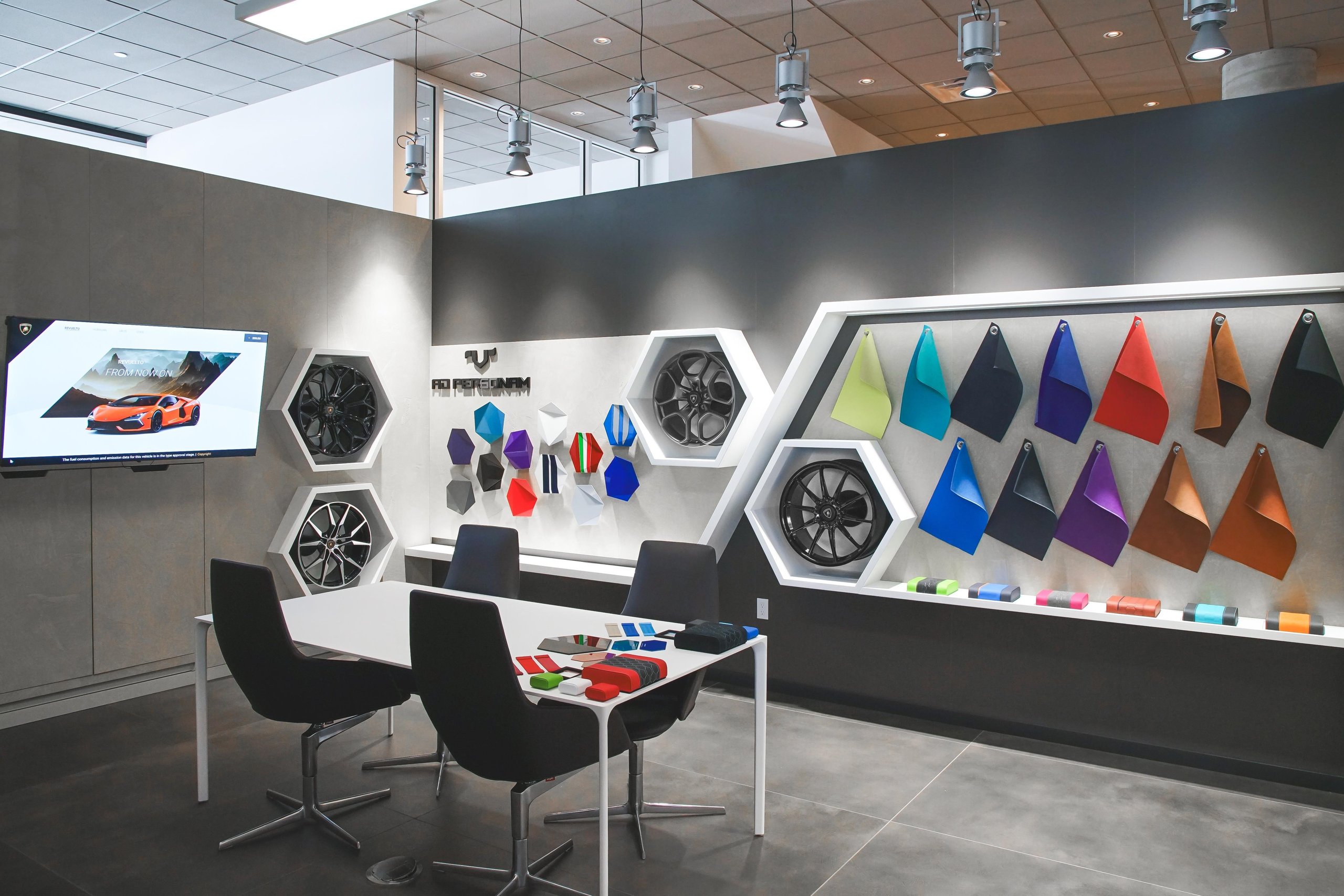 Lamborghini Seattle Opens In Bellevue With The Revuelto As Its Centerpiece, And That Pairing Tells You Everything About The Brand'S Strategy 5 Ad personam customization studio inside lamborghini seattle showing material samples, wheel options, and color swatches