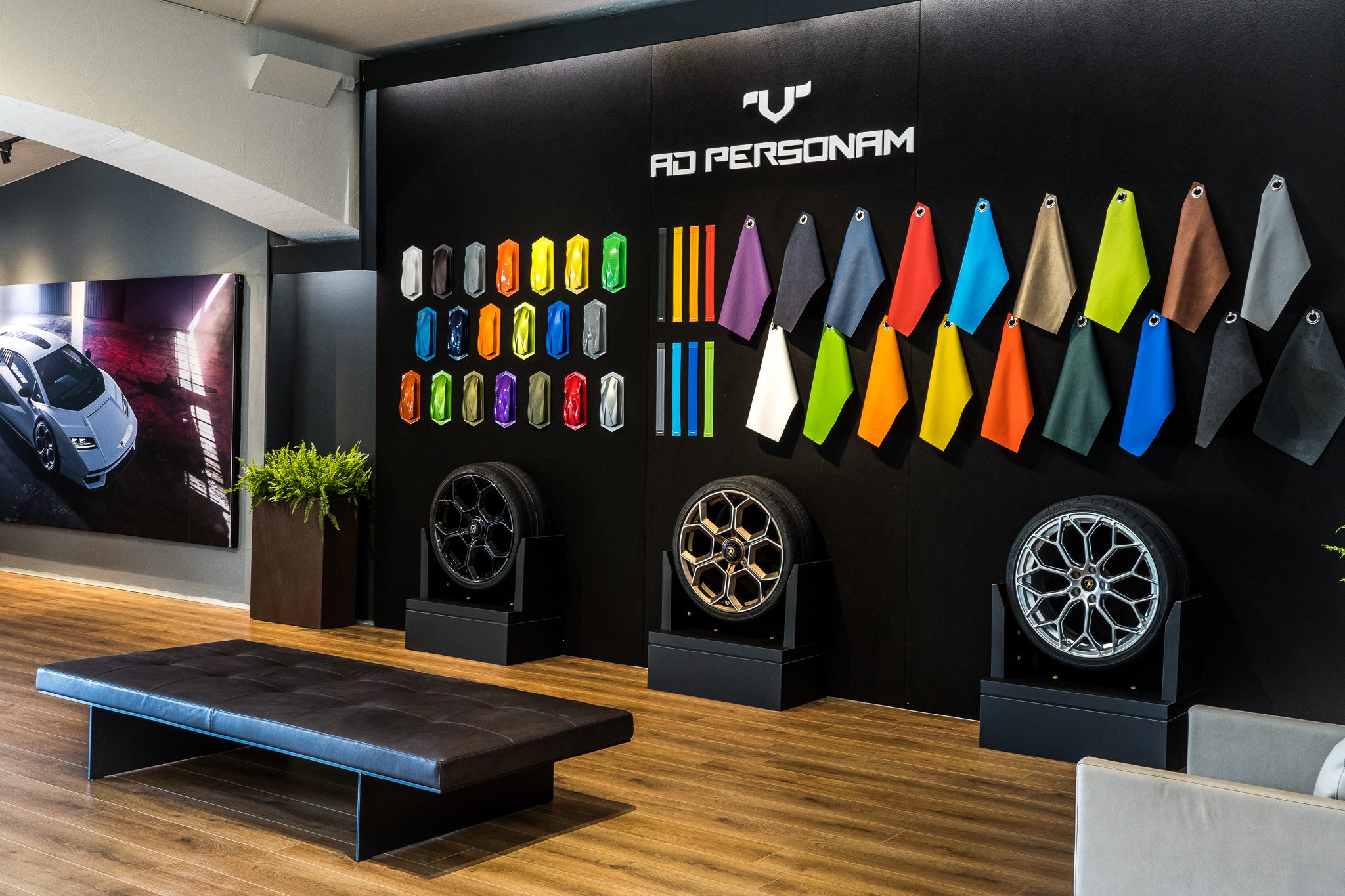 Inside Lamborghini'S Sardinia Summer Dinner, Where The Huracán Tecnica Met A 60-Knot Yacht 5 Lamborghini ad personam customization display showing paint samples, leather swatches, and wheel options