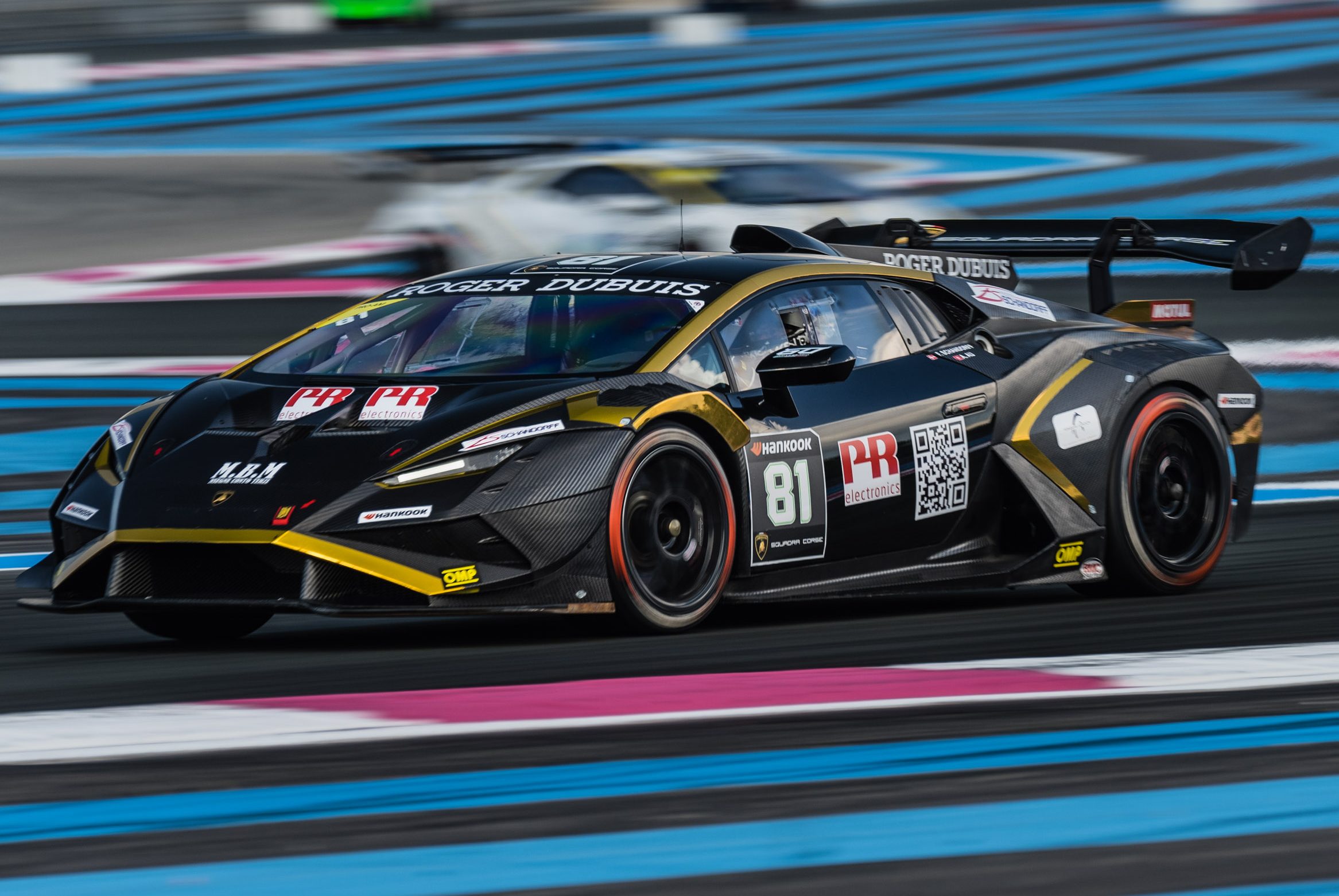 49 Huracán Evo2S At Spa: Lamborghini'S One-Make Series Celebrates 60 Years Where It All Began 7 Black and gold lamborghini huracán super trofeo evo2 at speed on track with motion blur indicating high velocity