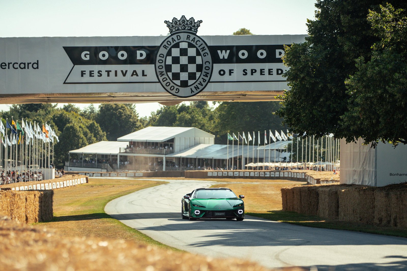Lamborghini Temerario GT3 in green, white, and red Tricolore livery driving on the Goodwood Festival of Speed hill climb