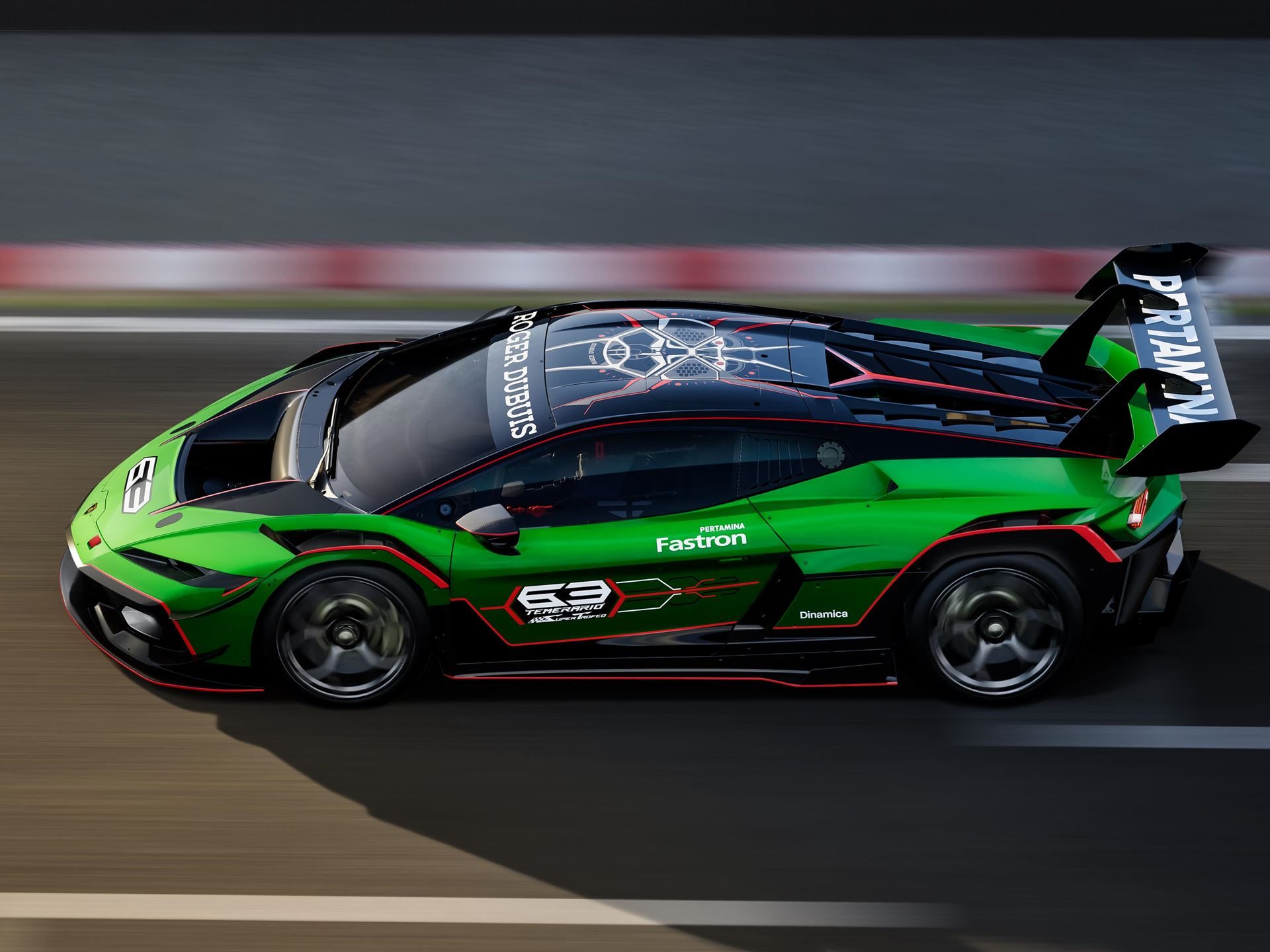 High-angle side view of the lamborghini temerario super trofeo in motion on track, showing aerodynamic design, sponsor decals, and roof scoop