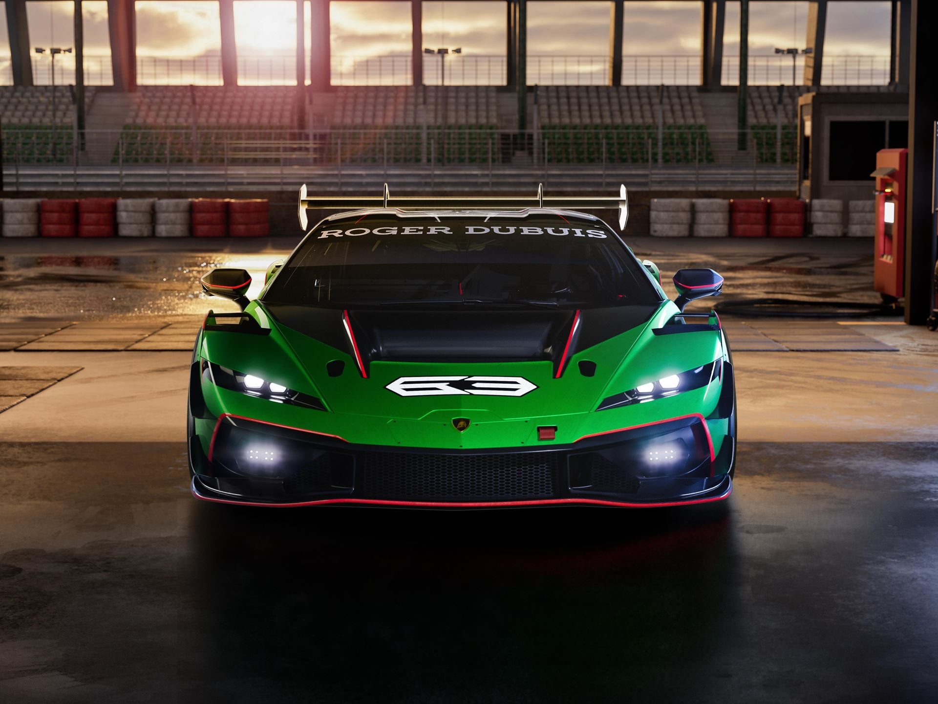Lamborghini temerario super trofeo parked in pit lane at sunset, showcasing aggressive front design and y-signature led headlights