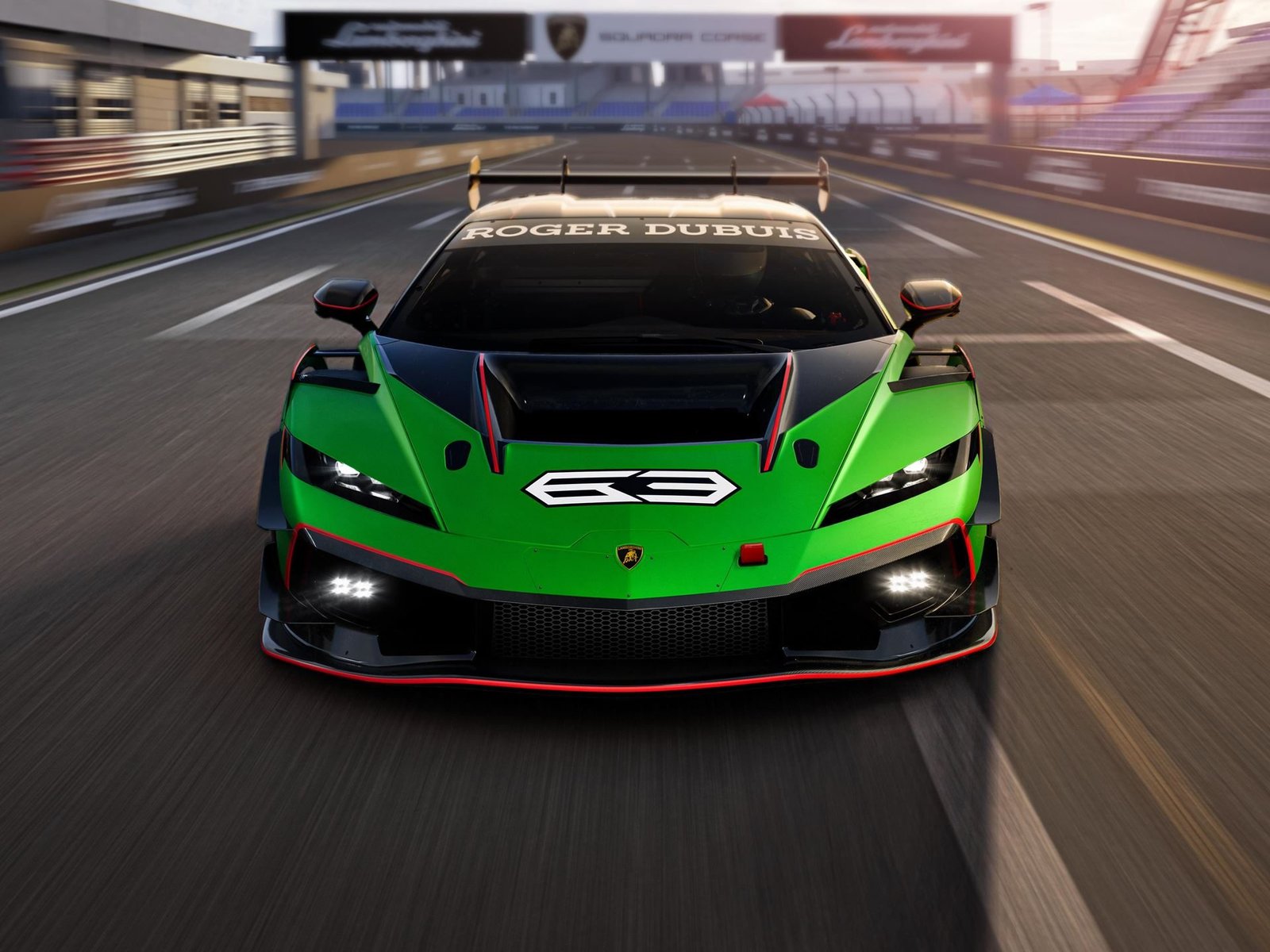 Lamborghini Temerario Super Trofeo race car in green and black livery speeding on track, viewed head-on with motion blur