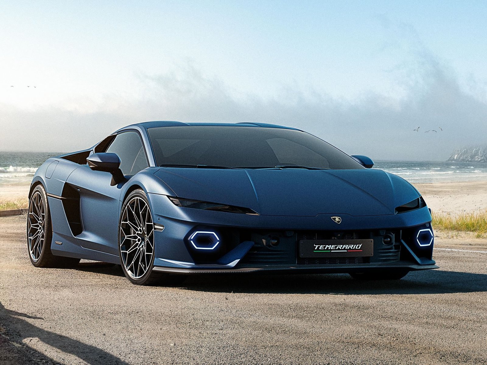 Blue Lamborghini Temerario on a coastal road with ocean and dunes in the background